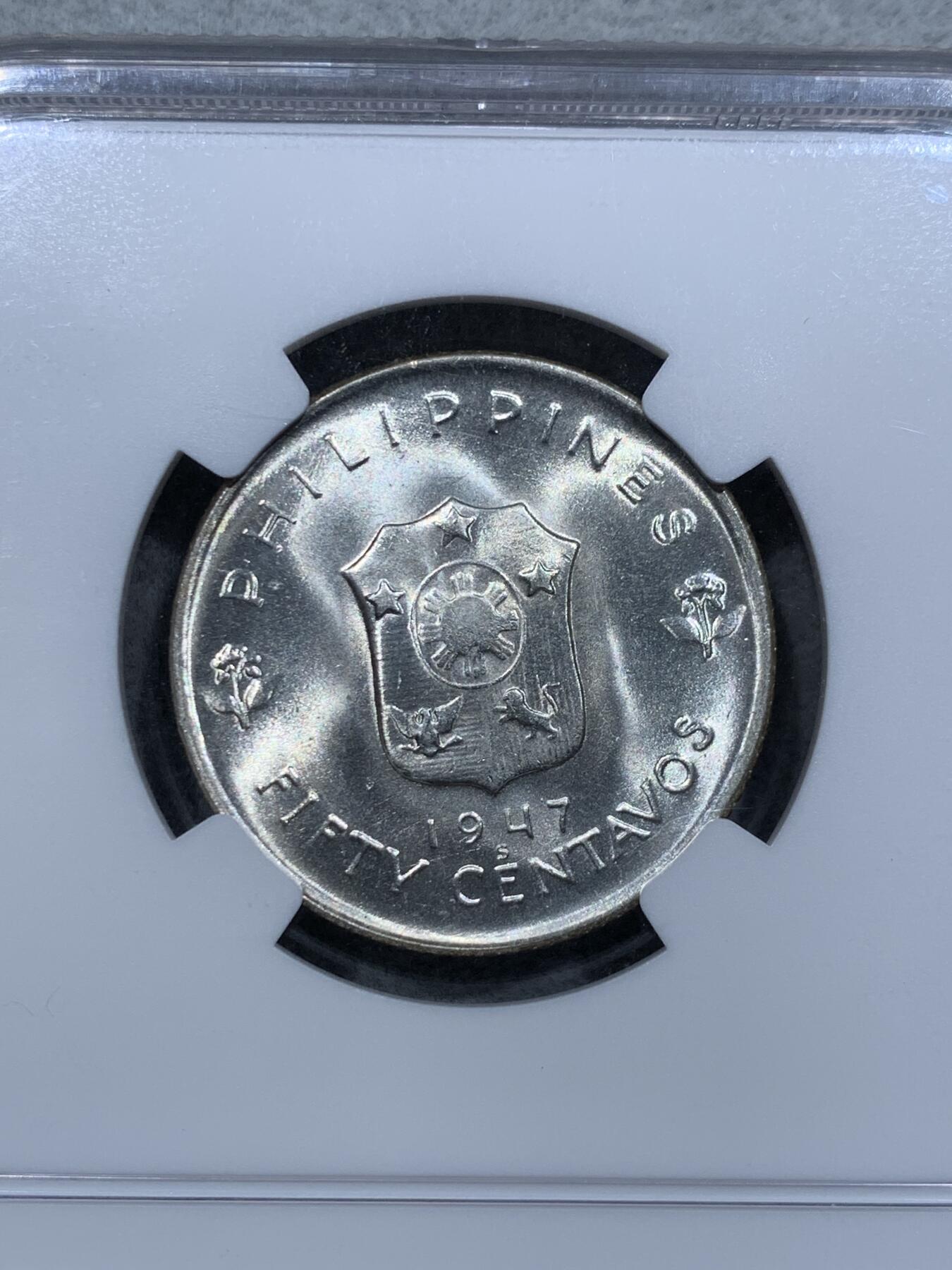《竞宝斋》第337场 周日，周一，周二 3场连拍 （全场包邮） NGC MS64 菲律宾1947年麦克阿瑟1比索和50分纪念银币，一对同分，转光强烈，底板干净