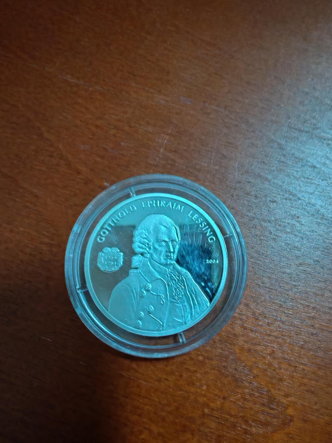 长老汇龙年精选第三十七场拍卖 2005贝宁莱辛1000法郎精制银币，15克999银，稀少