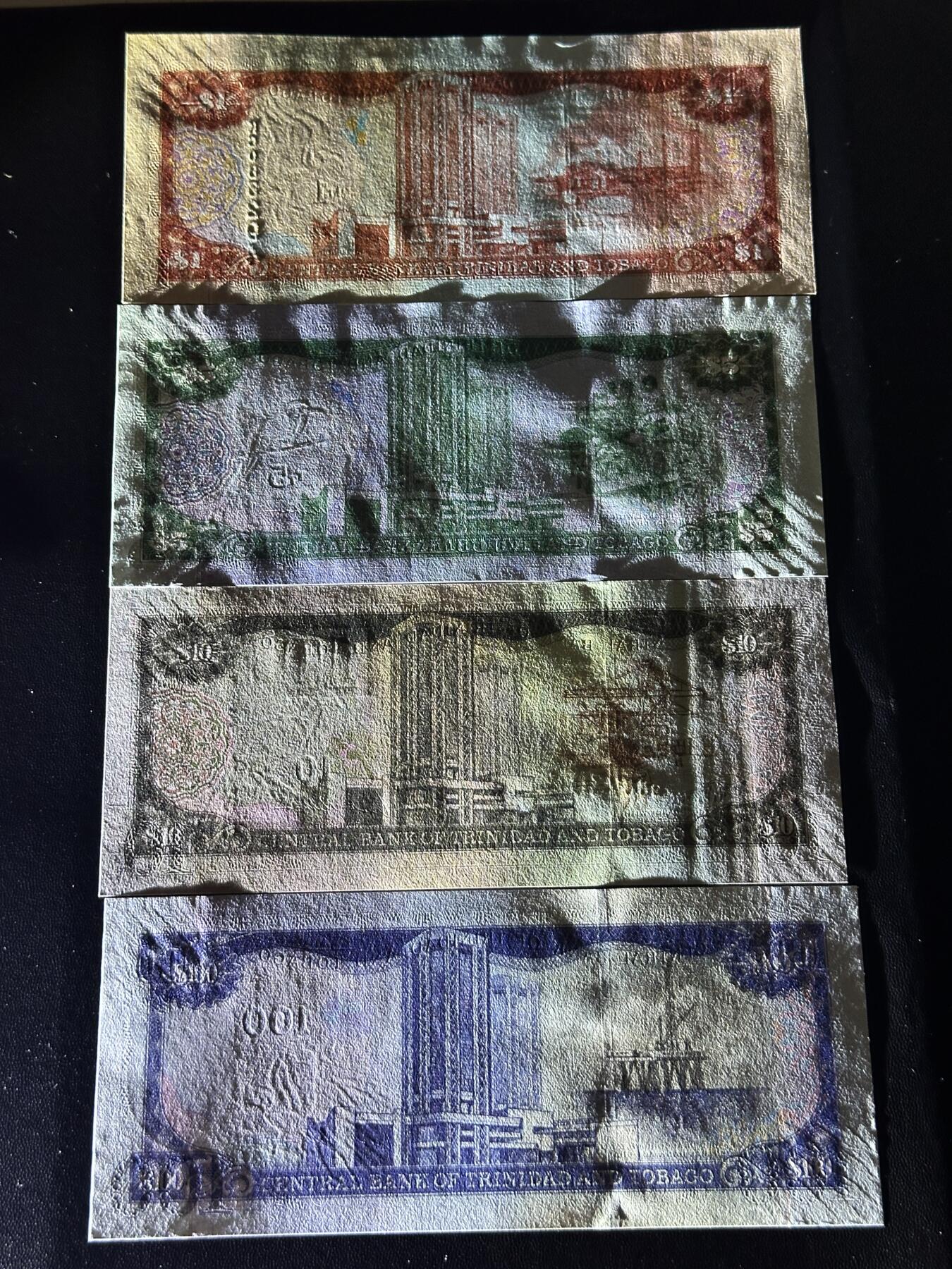 《外钞收藏家》第四百五十七期 2006年特里达尼亚和多巴哥一套 4张 全新UNC 初版 无全息条 相对稀少