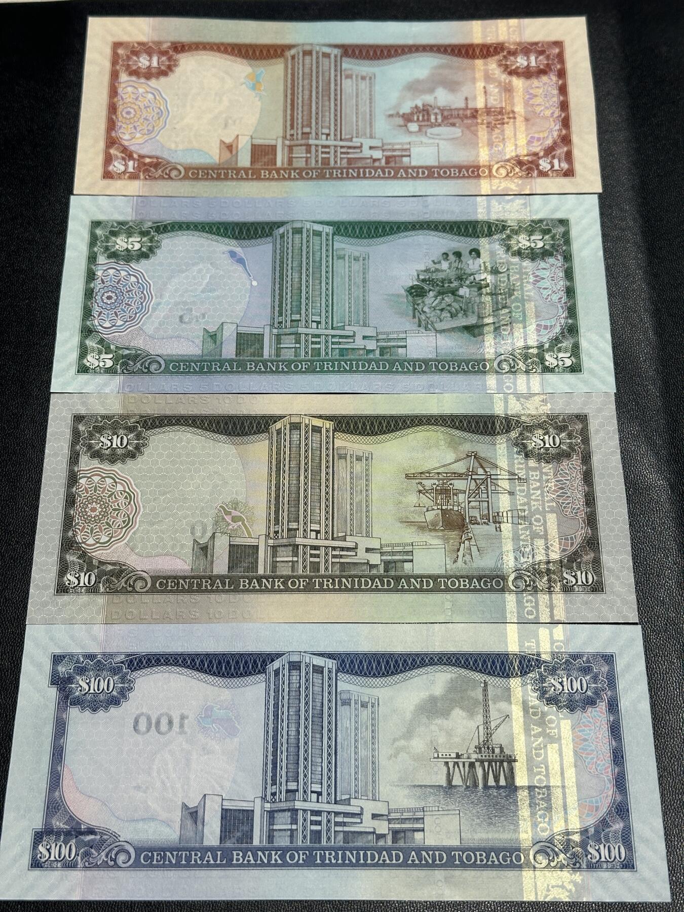 《外钞收藏家》第四百五十七期 2006年特里达尼亚和多巴哥一套 4张 全新UNC 初版 无全息条 相对稀少