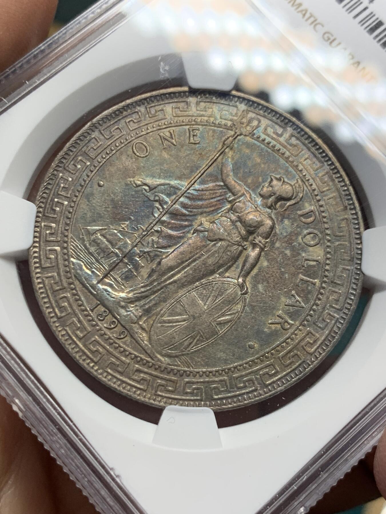 《竞宝斋》第338场 周日，周一，周二 3场连拍 （全场包邮） NGC AU 英国1899站洋一元au品，带彩带底光，细节清楚不错
