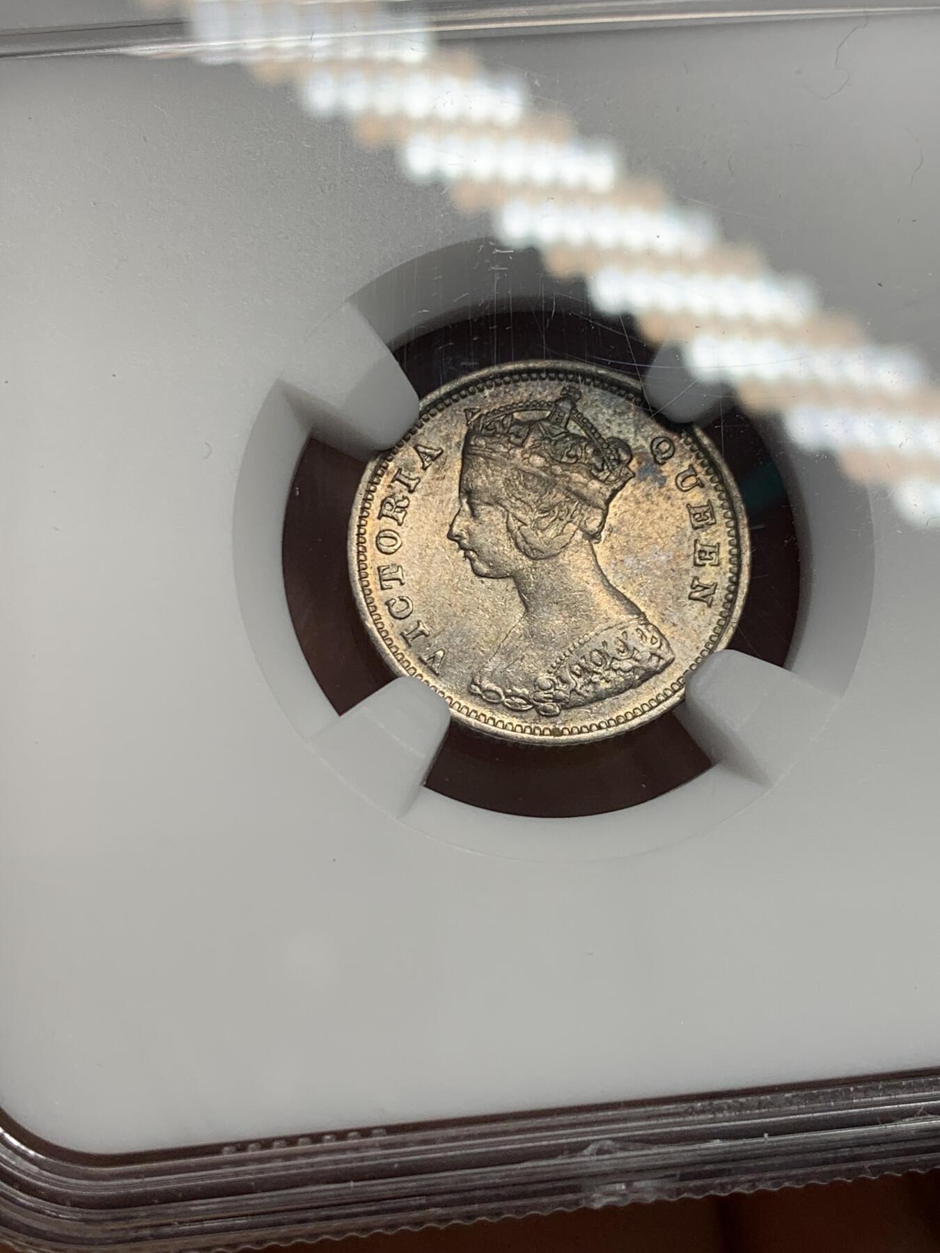 《竞宝斋》第338场 周日，周一，周二 3场连拍 （全场包邮） NGC AU50 香港 1897年 一毫 维多利亚 银币 原味币 开始包浆还带少许原光