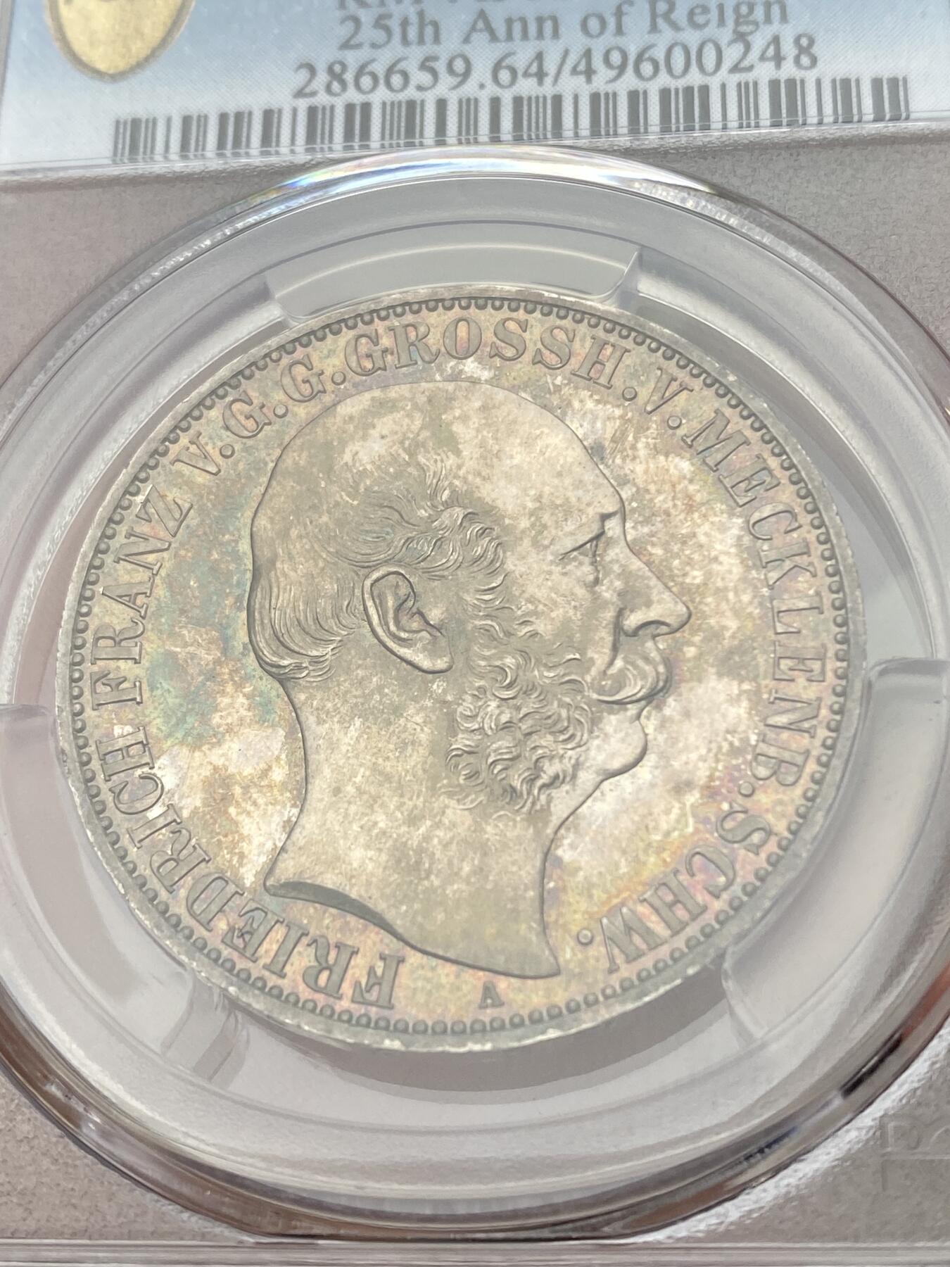 万国钱币拍卖第039期 PCGS MS64 1867德国梅克伦堡-什未林纹章泰勒 顶级五彩BU品，底板类镜面质感，非常华丽的小邦纹章。