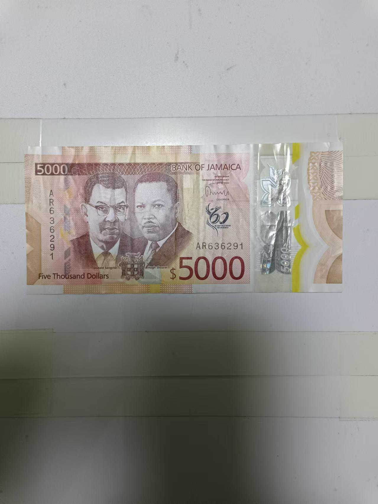 【20241219】非全新纸币第203场 牙买加5000元塑料钞，有裂缝，市场价全新555元左右