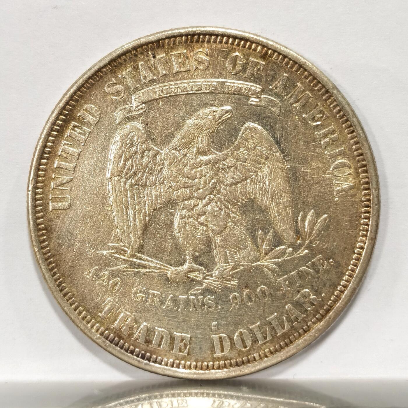 博洋堂世界钱币拍卖第104期（全场包邮） 贸易银币中的名誉品，1877美国拿花大银币，人物、文字和老鹰轮廓清晰深打，币面基本无磨损，转光品质