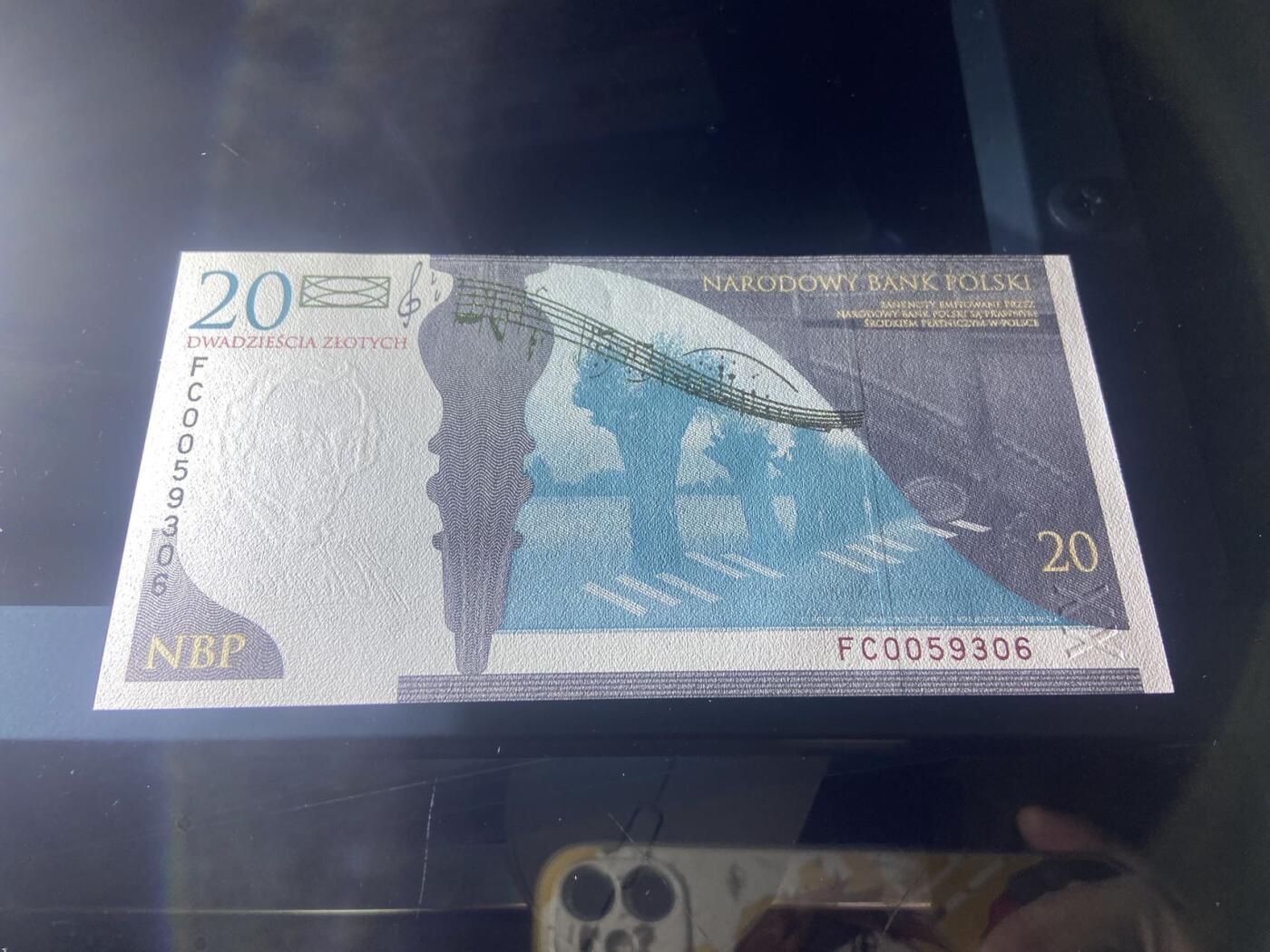 【炜奕收藏】，二十一期 【无47】波兰20兹罗提肖邦纪念钞，UNC品相，号码无47，带原装册