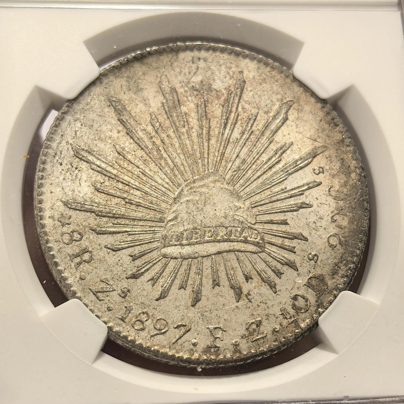 博洋堂世界钱币拍卖第104期（全场包邮） 墨西哥1897年花边鹰洋8瑞尔银币NGC-MS61，原汁原味老包浆，包浆醇厚，铸打深峻，极美月牙五彩，低评，状态和品质绝对不输MS62。