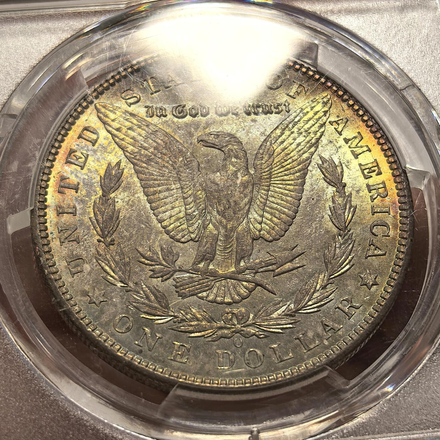 博洋堂世界钱币拍卖第104期（全场包邮） PCGS MS64 美国1904年O版摩根$1银币 双面渐变五彩包浆 光面底板 外壳在运输途中磕裂 未影响密封 瑕不掩瑜