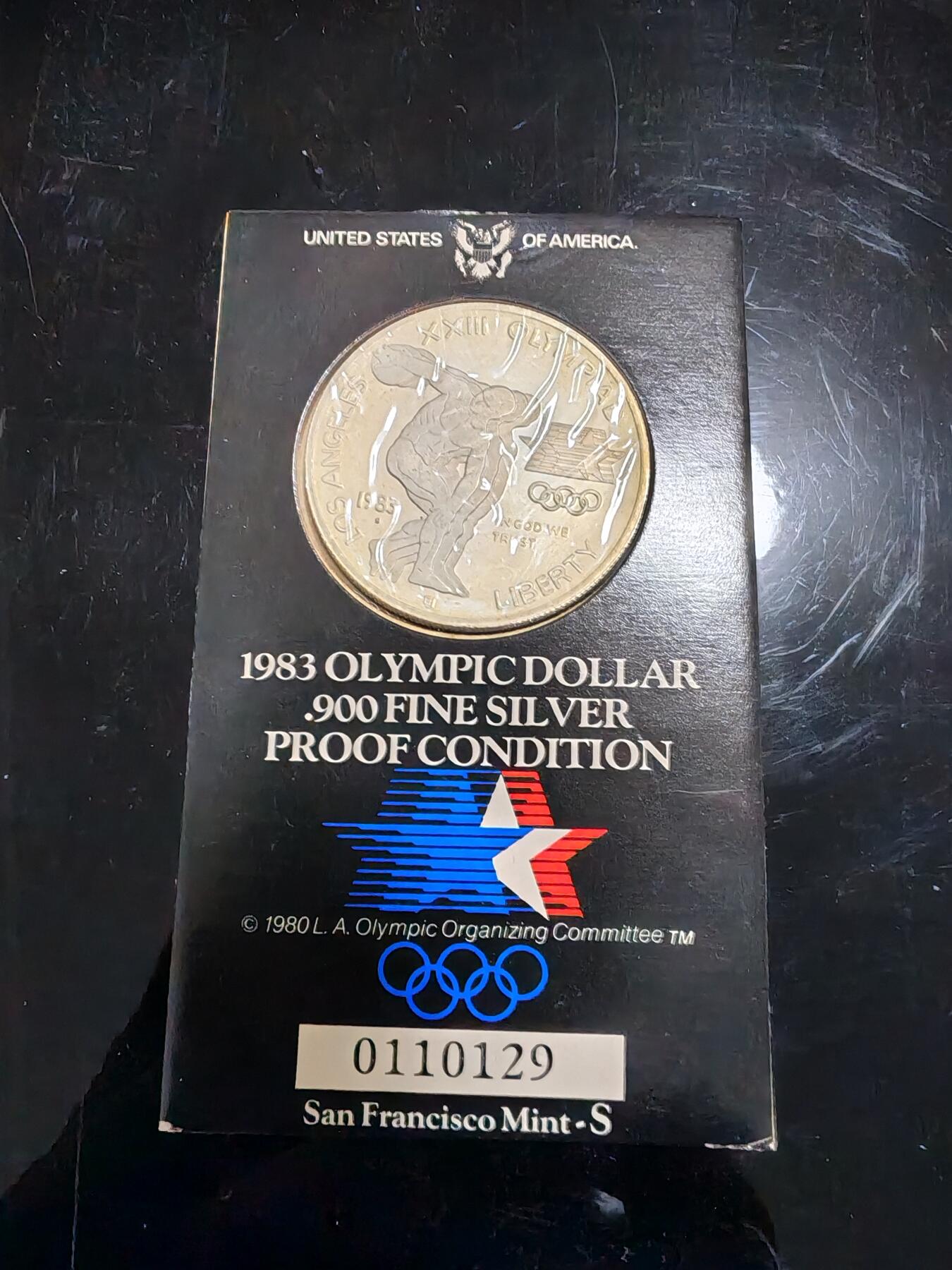 长老汇龙年精选第三十八场拍卖 1983洛杉矶奥运1美元精制银币，红绒卡装，包浆