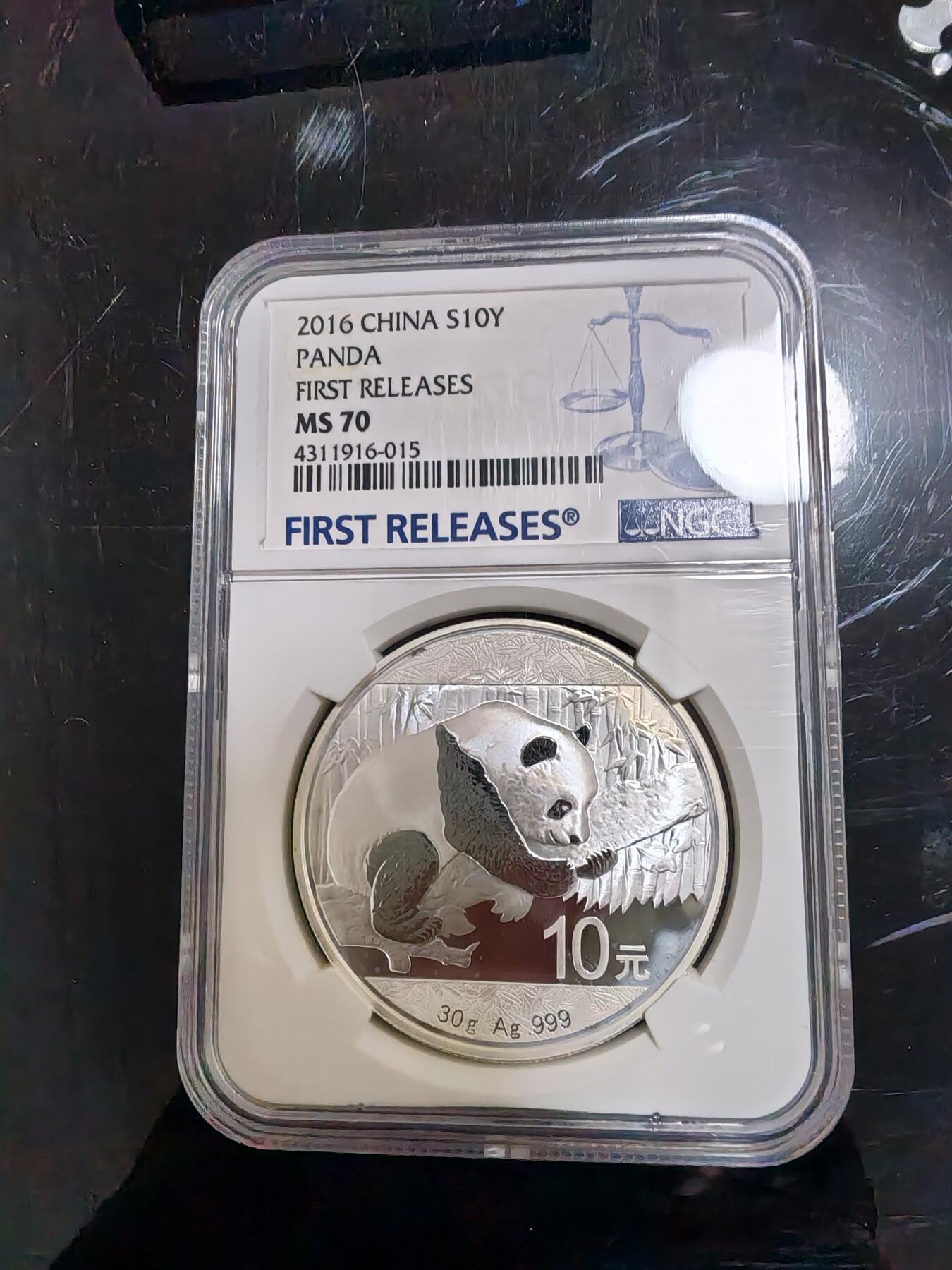 长老汇龙年精选第三十八场拍卖 2016中国熊猫10元银币，NGC MS70，首期标
