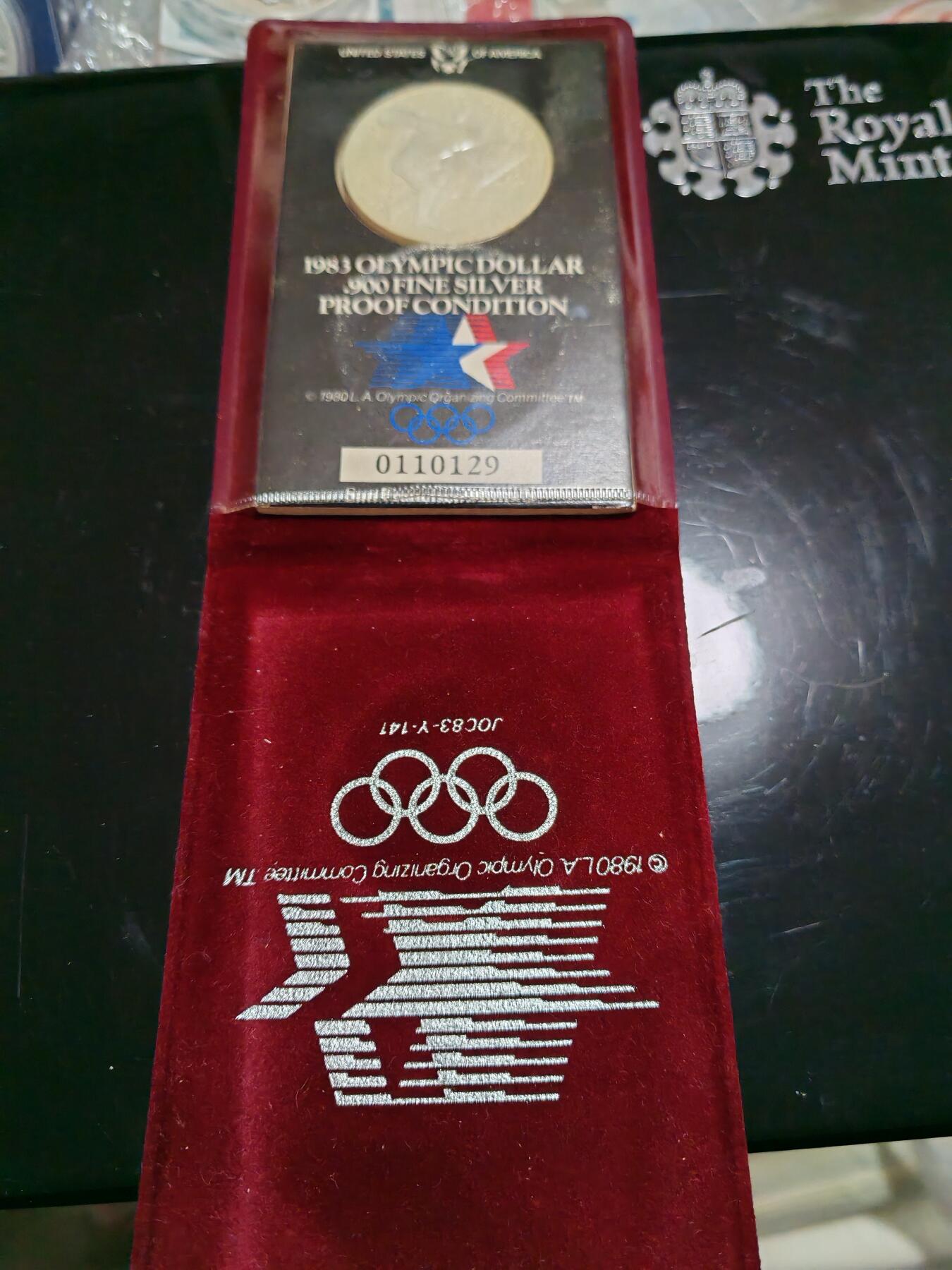 长老汇龙年精选第三十八场拍卖 1983洛杉矶奥运1美元精制银币，红绒卡装，包浆