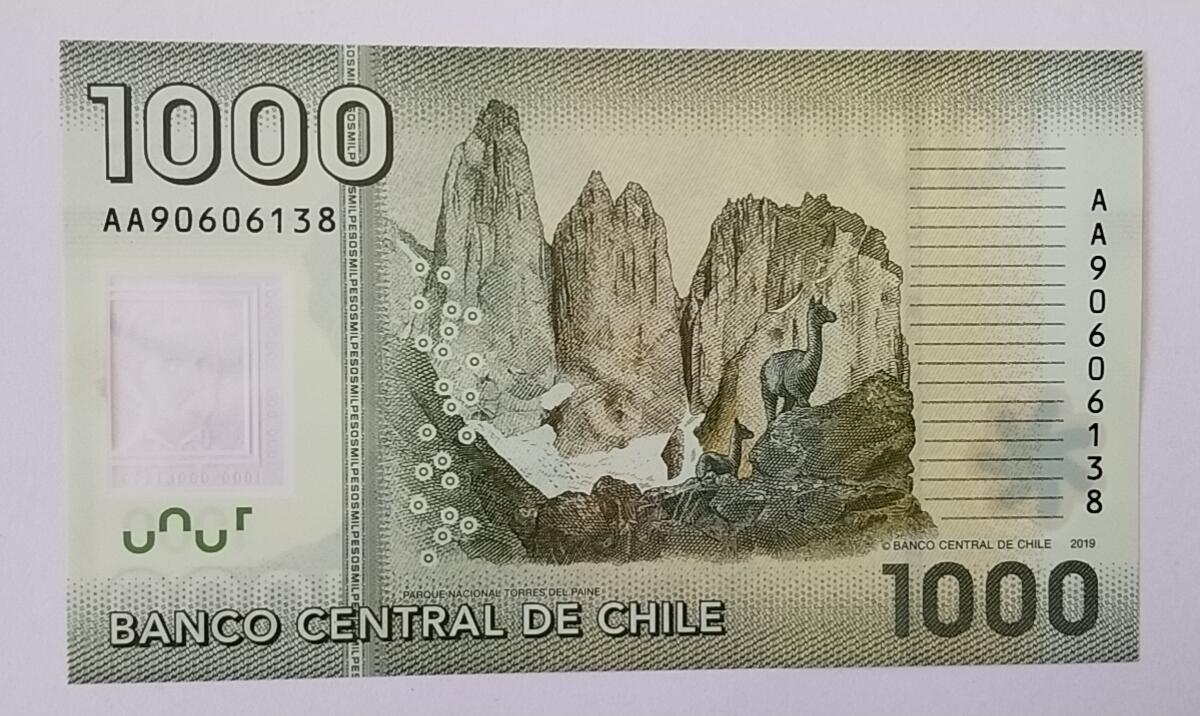 天和轩精品钱币第51场 全新unc  智利1000塑料钞  首发AA冠 无4/7