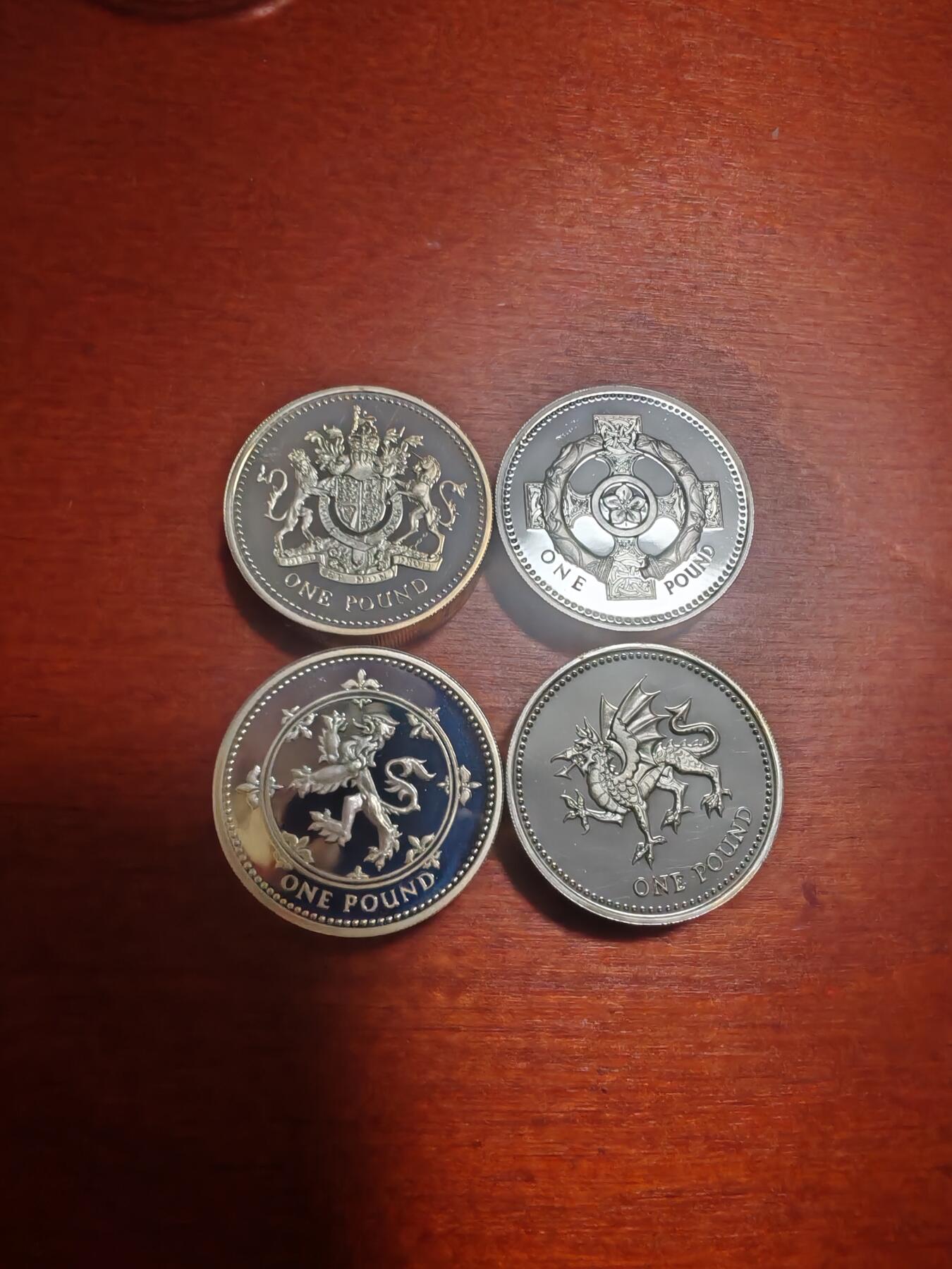 长老汇龙年精选第三十九场拍卖 1998-2001英国1英镑精制加厚银币4枚，盒证全