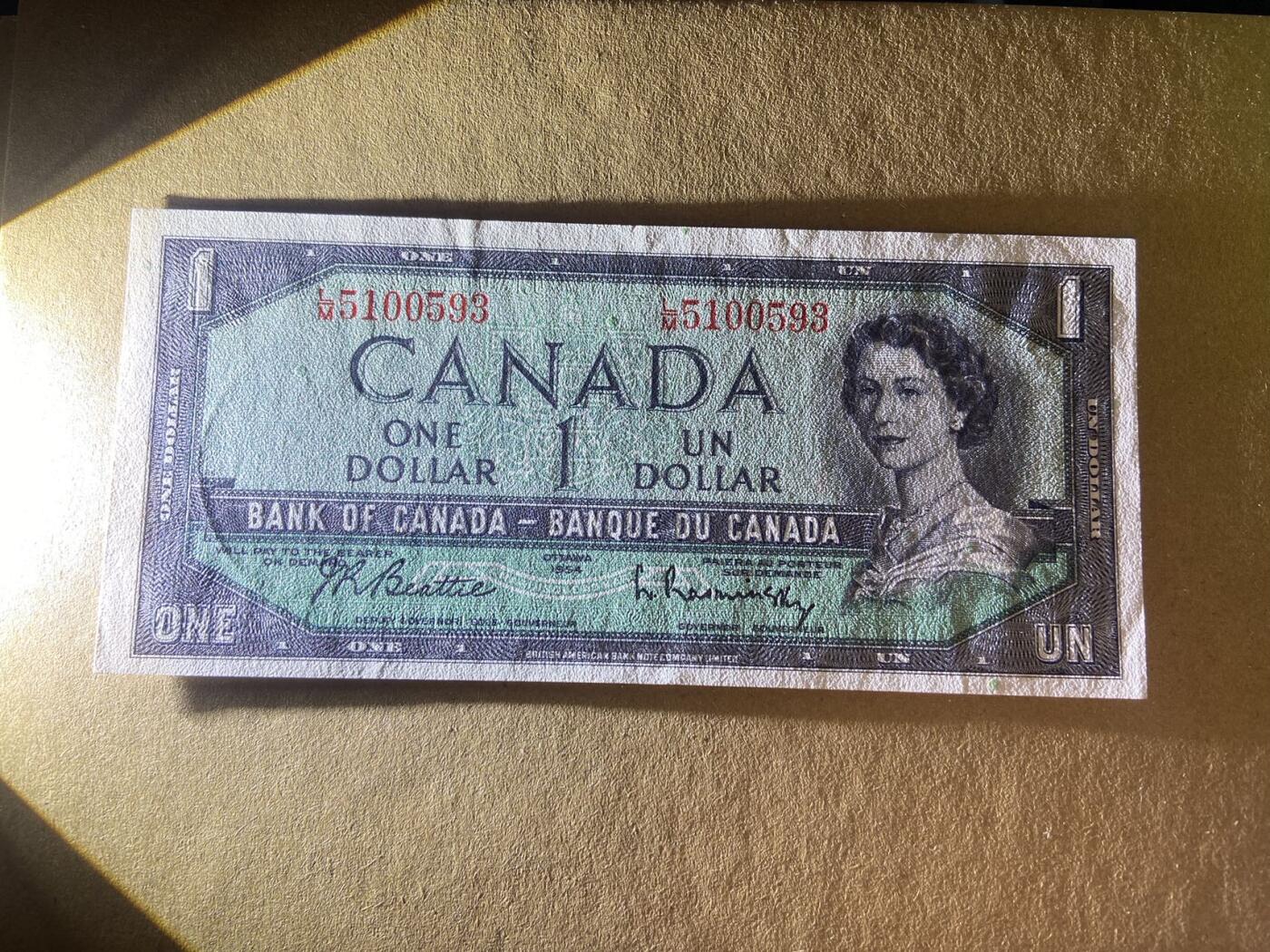【炜奕收藏】，二十一期 【无47】加拿大1954年1元，UNC品相，号码无47