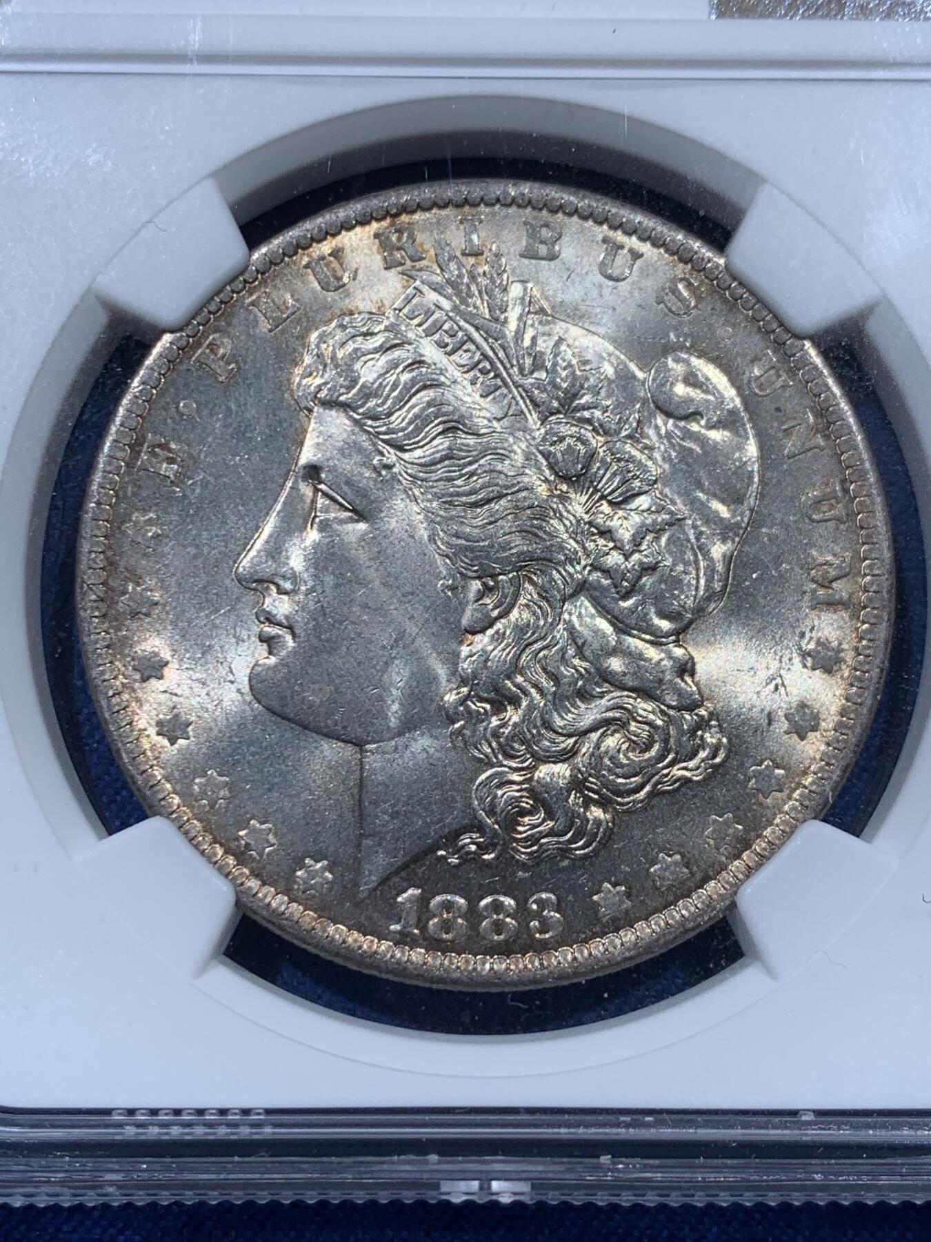 《竞宝斋》第341场 周日，周一，2场连拍 （全场包邮） NGC MS63 美国 1883年摩根银币 带漂亮彩，光度很好，女神发丝清晰