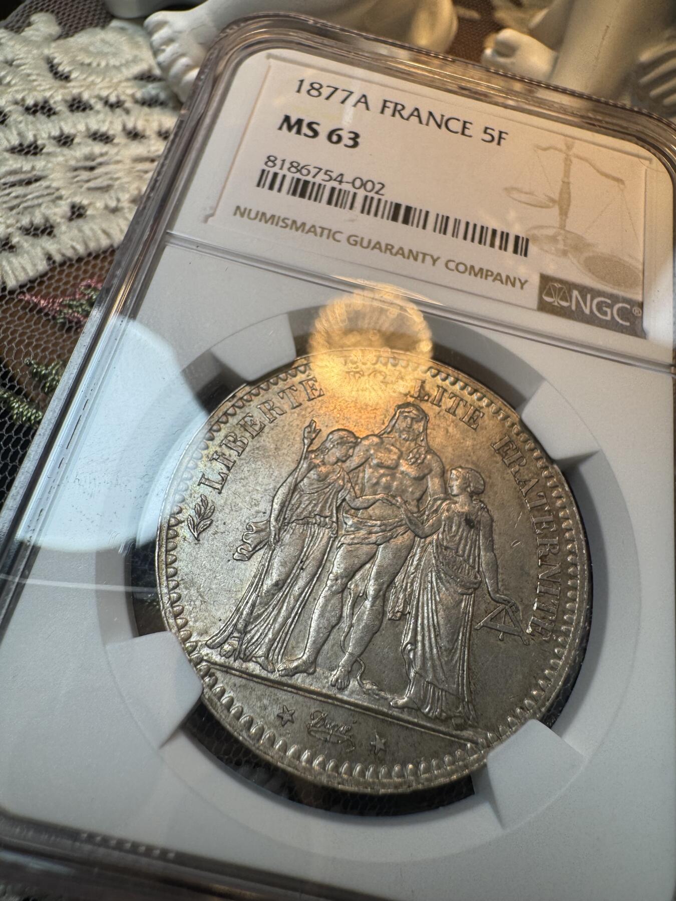 “一元初始，万象更新”新年新铺开张 全场免押0佣金 NGC MS63 1877年法国大力神5法郎，少见年份，高分更少，包浆自然