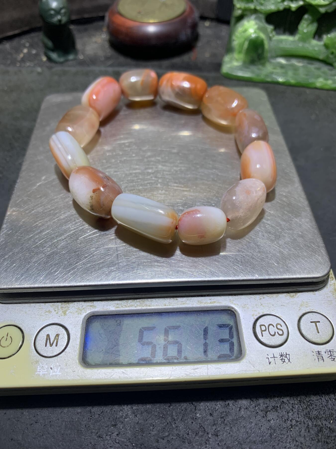 川料南红玛瑙荔枝冻飘红随形手串一条，