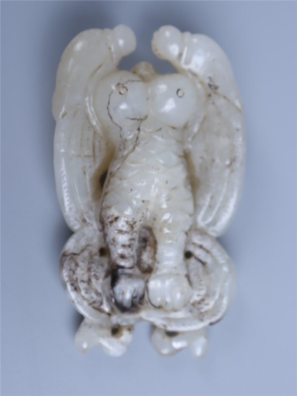 承乾2024年秋季文物艺术品拍卖会 清 白玉迦楼罗把件 1 8.48*4.82cm 87.68g 玉