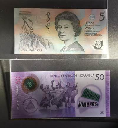 《张总收藏》181期-外币精品百拍特别场 (2张首发)澳大利亚1992年初版首发AA冠5元UNC无47 Pick#50a/尼加拉瓜2014年A冠50科多巴无47 Pick#211
