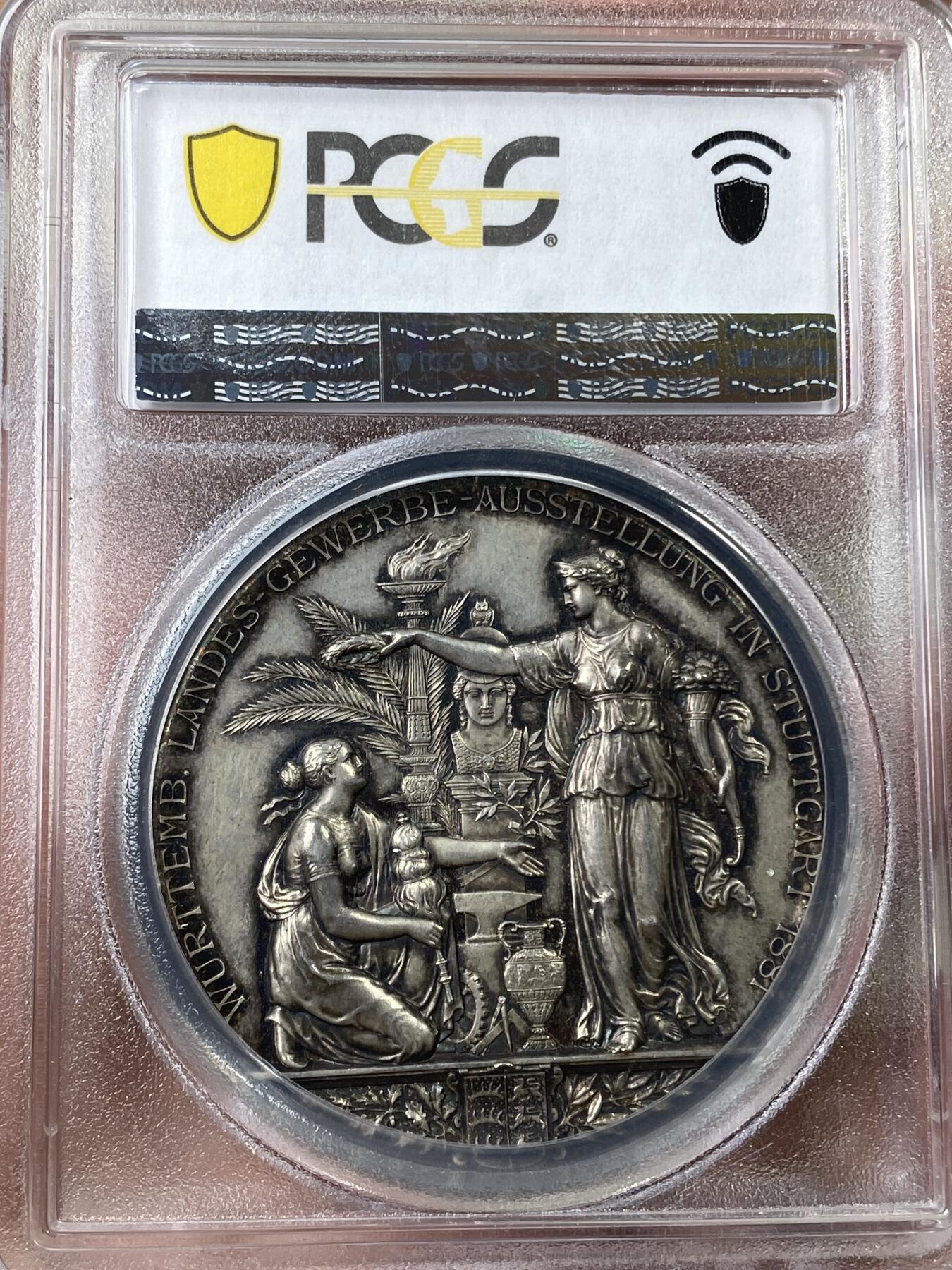 万国钱币拍卖第040期（万国2025新年大拍） PCGS SP62 1881年德国符腾堡公国斯图加特贸易展纪念大银章 五彩高浮雕名誉品 45.3MM 35.8G 同款24年7月6K+成交