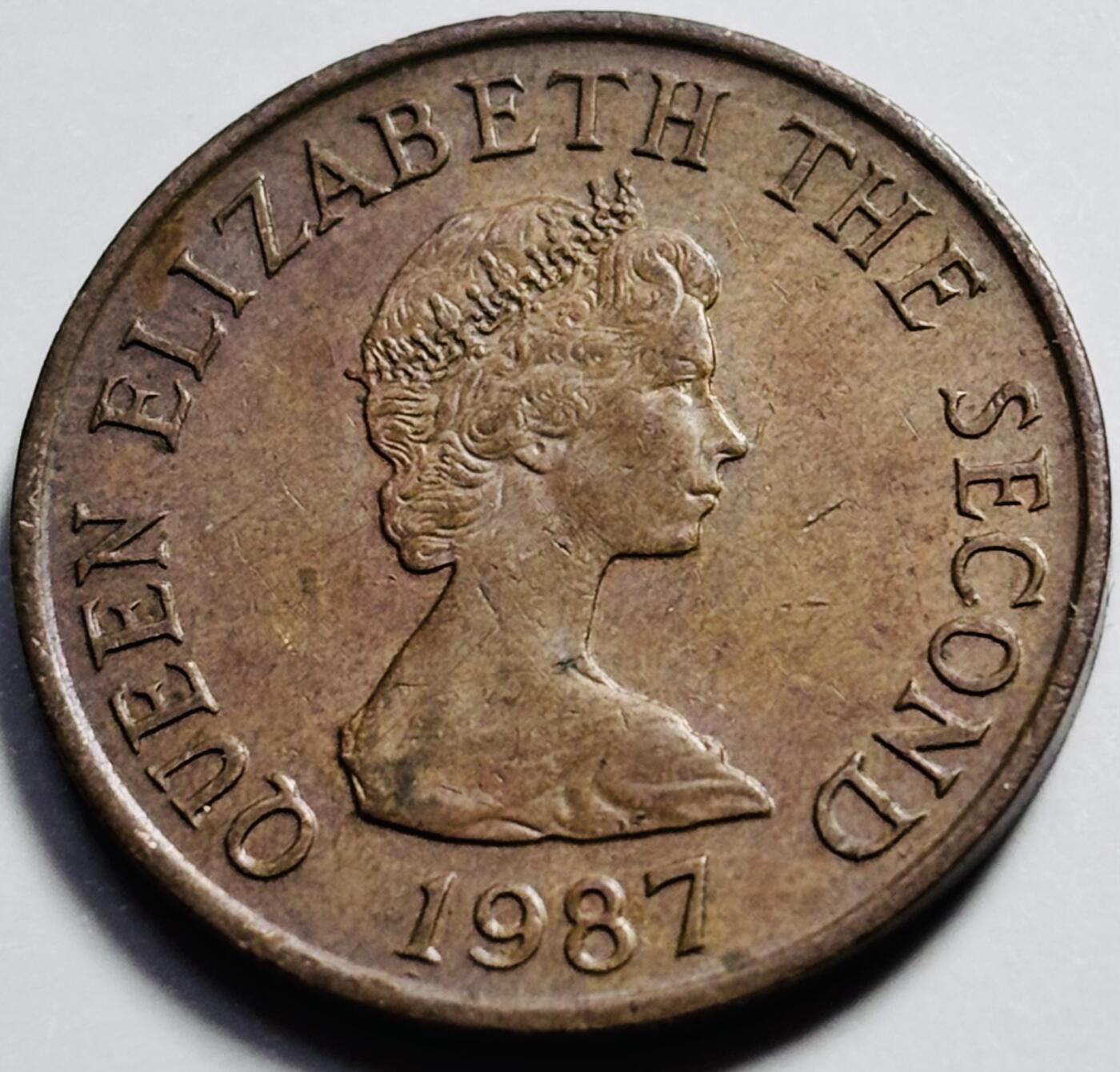 文馨钱币收藏第 203 场，英系套册纪念币，古铜币 好品 1987 年英属泽西 1 便士铜币