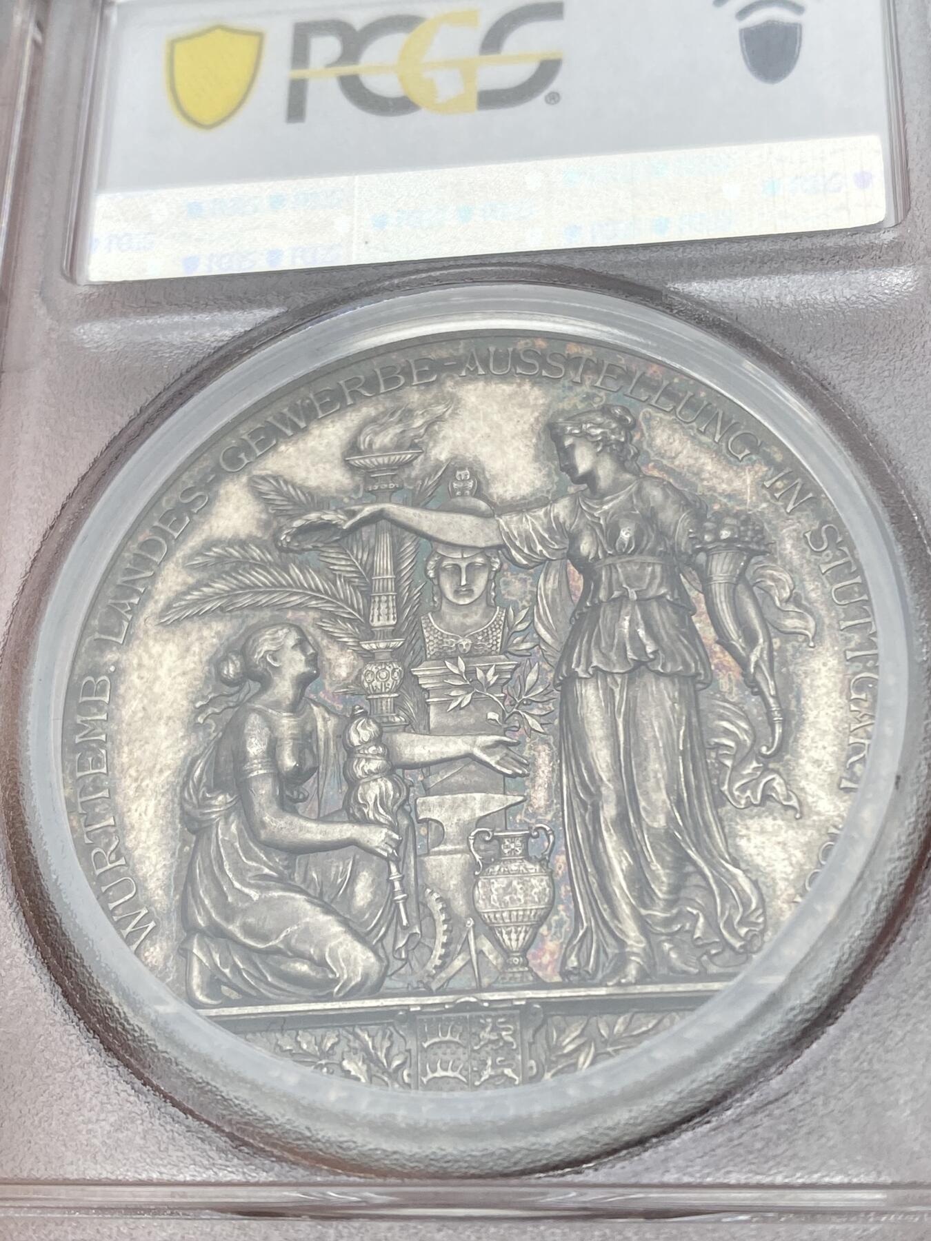 万国钱币拍卖第040期（万国2025新年大拍） PCGS SP62 1881年德国符腾堡公国斯图加特贸易展纪念大银章 五彩高浮雕名誉品 45.3MM 35.8G 同款24年7月6K+成交