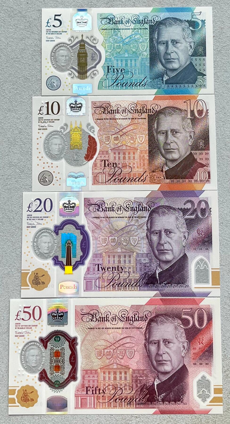 澳门钞、老台币、直布罗陀样钞、英国查尔斯国王新版英镑纸币首发冠千位号，台湾宝星奖章、联勤荣誉纪念章，韩国/哈萨克斯坦套币纪念币，图瓦卢/台湾生肖银币、陈水扁入职银币、台湾精制套币等。彼得堡世界钱币勋章拍卖第117期 英国2024年新版5-10-20-50英镑塑料钞4枚全套纸币，查尔斯国王、全新品相。首发冠千位全同号、第2497号