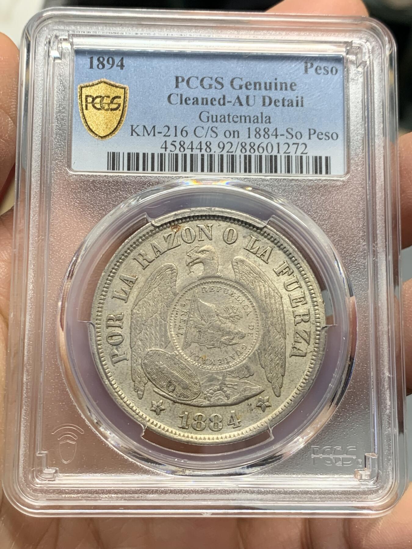 《竞宝斋》第342场 周日，周一，2场连拍 （全场包邮） PCGS AUD 危地马拉1894年加盖1884年智利秃鹰比索银币，稀见品种，没几个成交纪录，少见品种