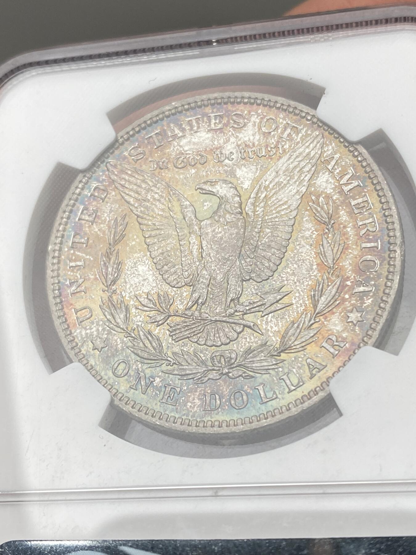 万国钱币拍卖第040期（万国2025新年大拍） NGC MS66 1887年美国摩根女神1元银币 七彩倒影包浆顶级收藏品质