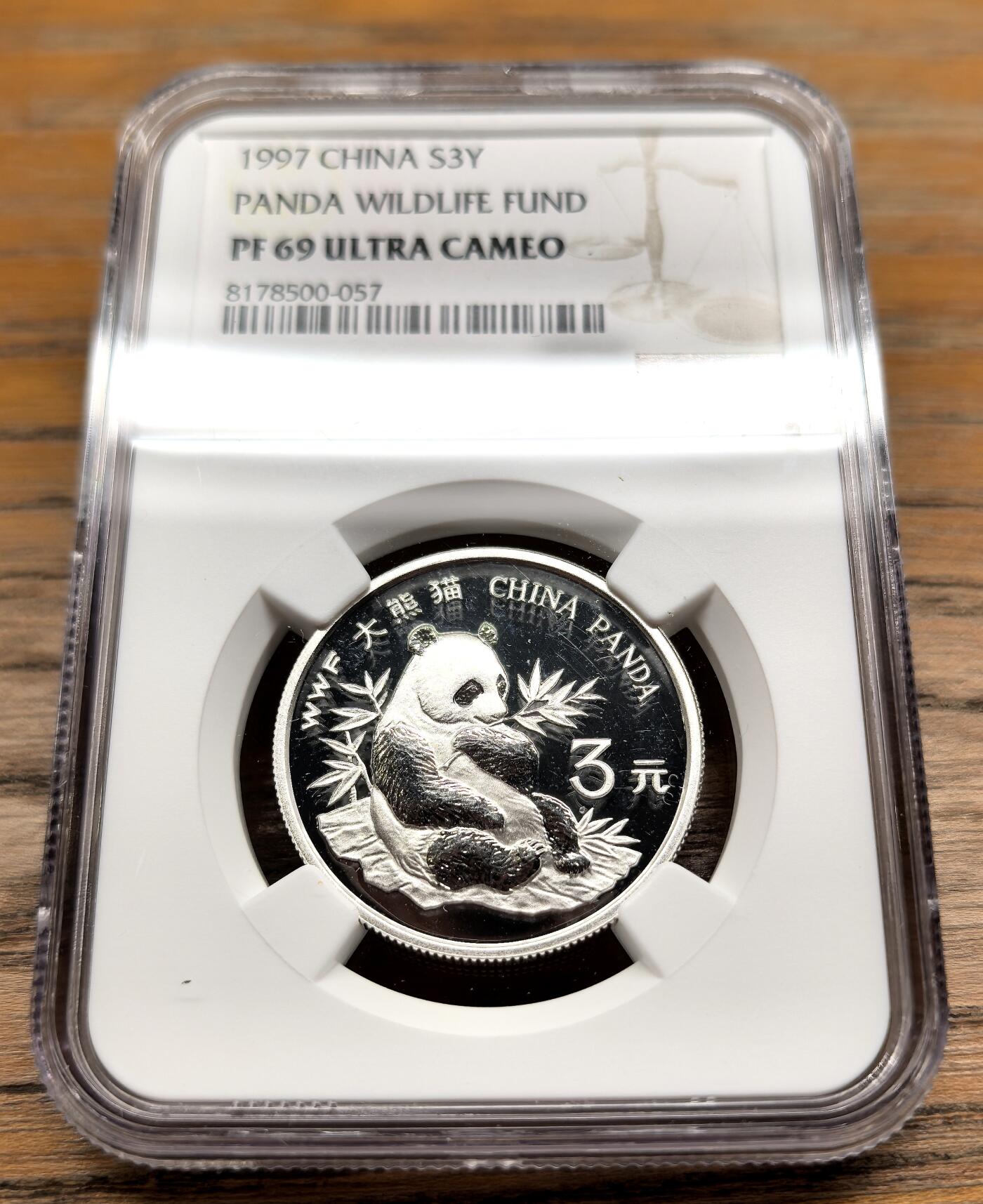 凡希社世界钱币微拍第二百九十四期 1997中国WWF大熊猫3元银币NGC-PF69UC，罕见的三元面值，顶级品相。