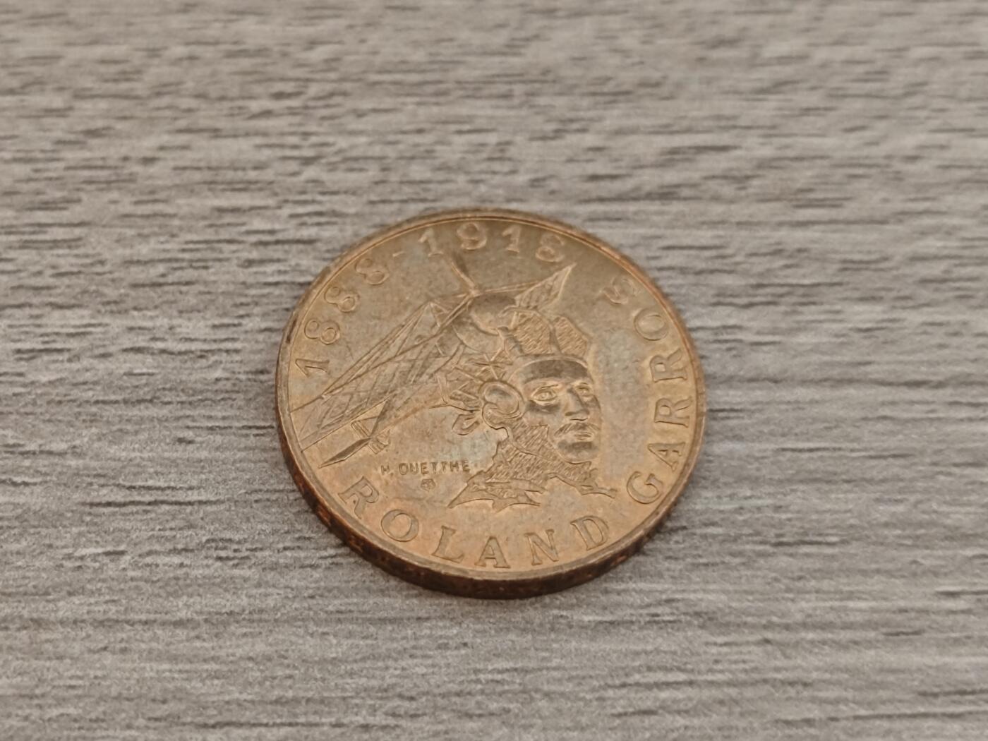 小小杂货铺22期  满五十包邮 可寄存 一元佣金 （银币、散币） 1988年飞行员罗兰卡洛斯逝世70周年10法朗纪念币，