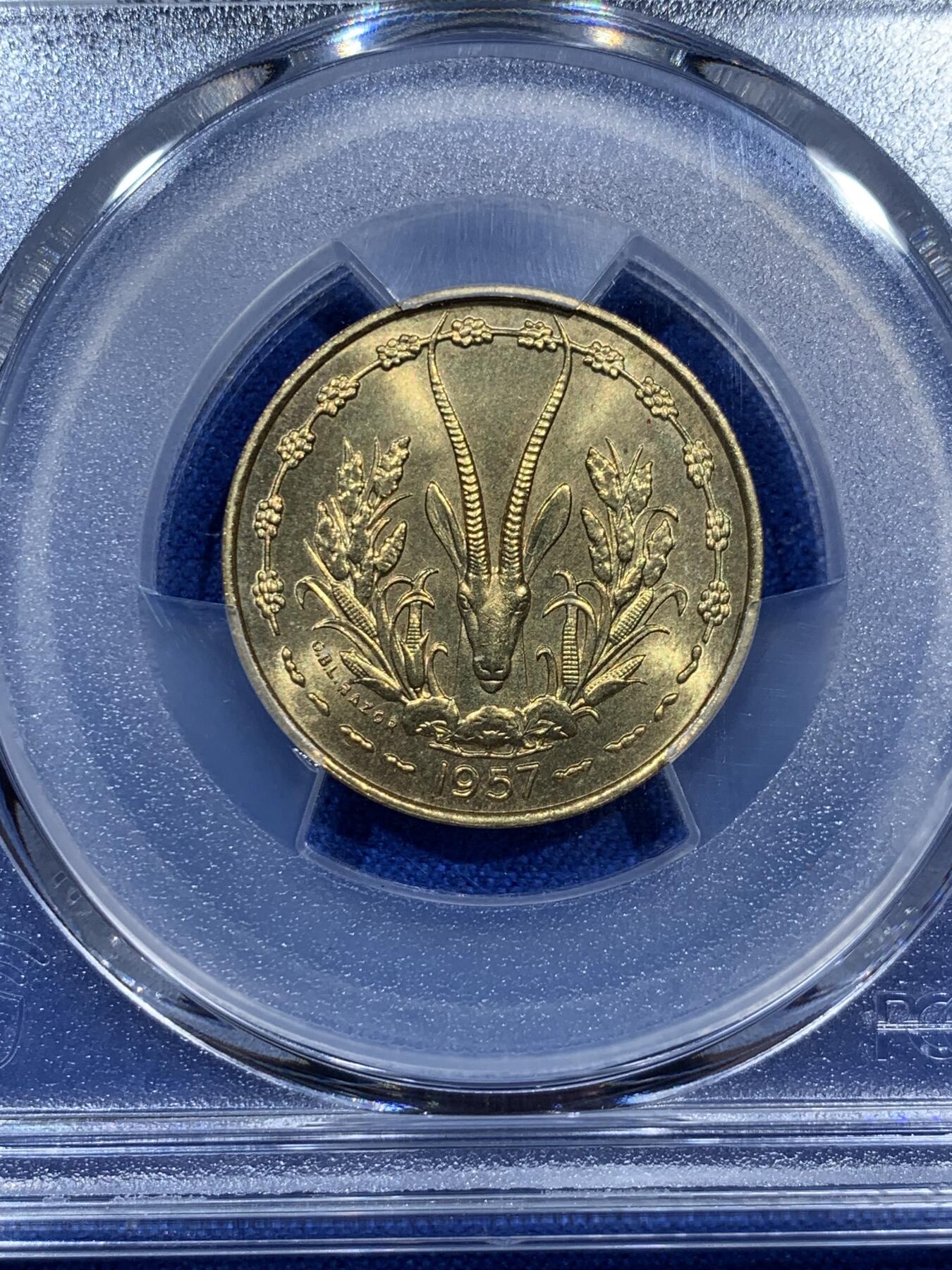 《竞宝斋》第343场 周日，周一，2场连拍 （全场包邮） PCGS MS65 法属西非1957年10法郎 品种常见 但是高分困难 很靓的一枚黄铜币 羚羊图案经典 喜欢非洲的不要错过了