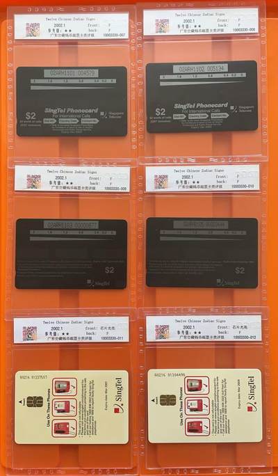 《卡拍》第317期拍卖1月4日晚22：10时延时截拍 新加坡珍藏版GPT、IC卡《十二生肖-春到河畔迎新年》十二全新卡，公藏评级68分。GPT卡十枚（自1996鼠年-2004年发行），IC卡两枚（2006狗年-2007猪年），成套卡极少见。