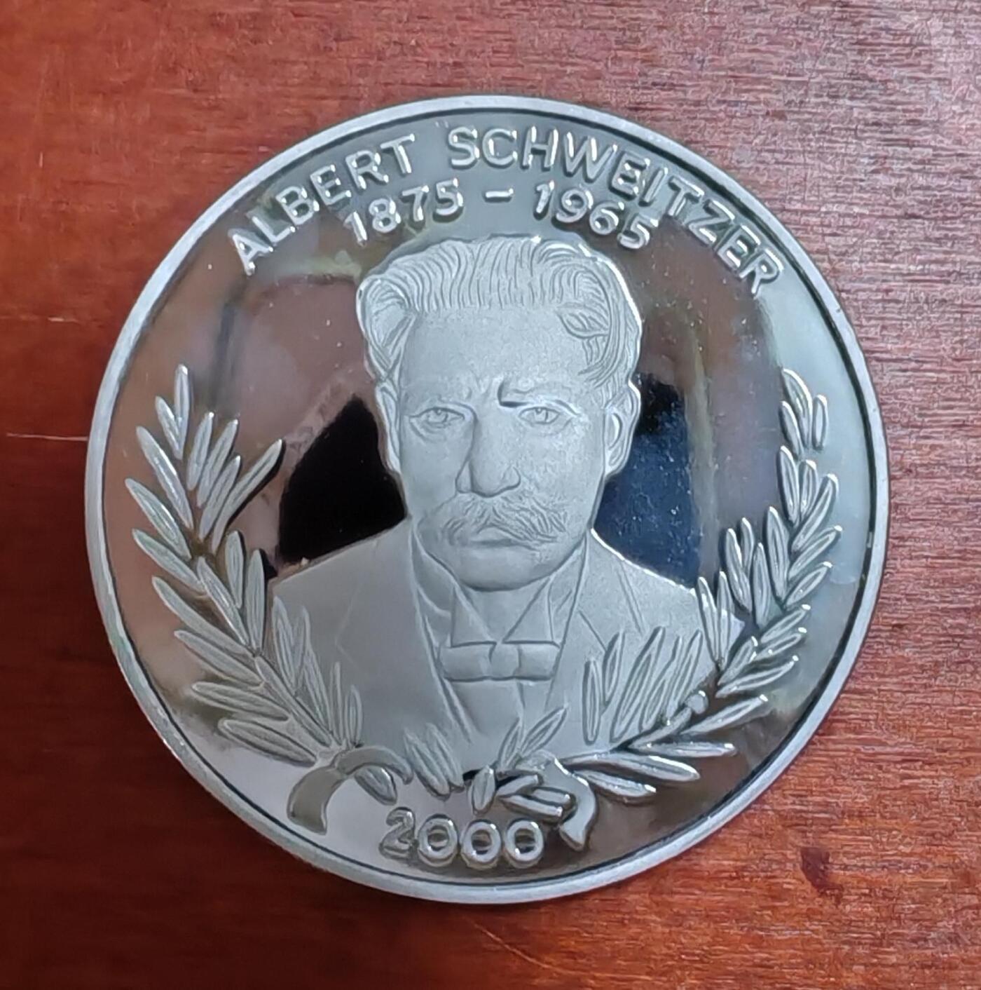 长老汇龙年精选第四十场拍卖 2000多哥施韦泽1000法郎精制银币，错版币见红圈处的眉毛