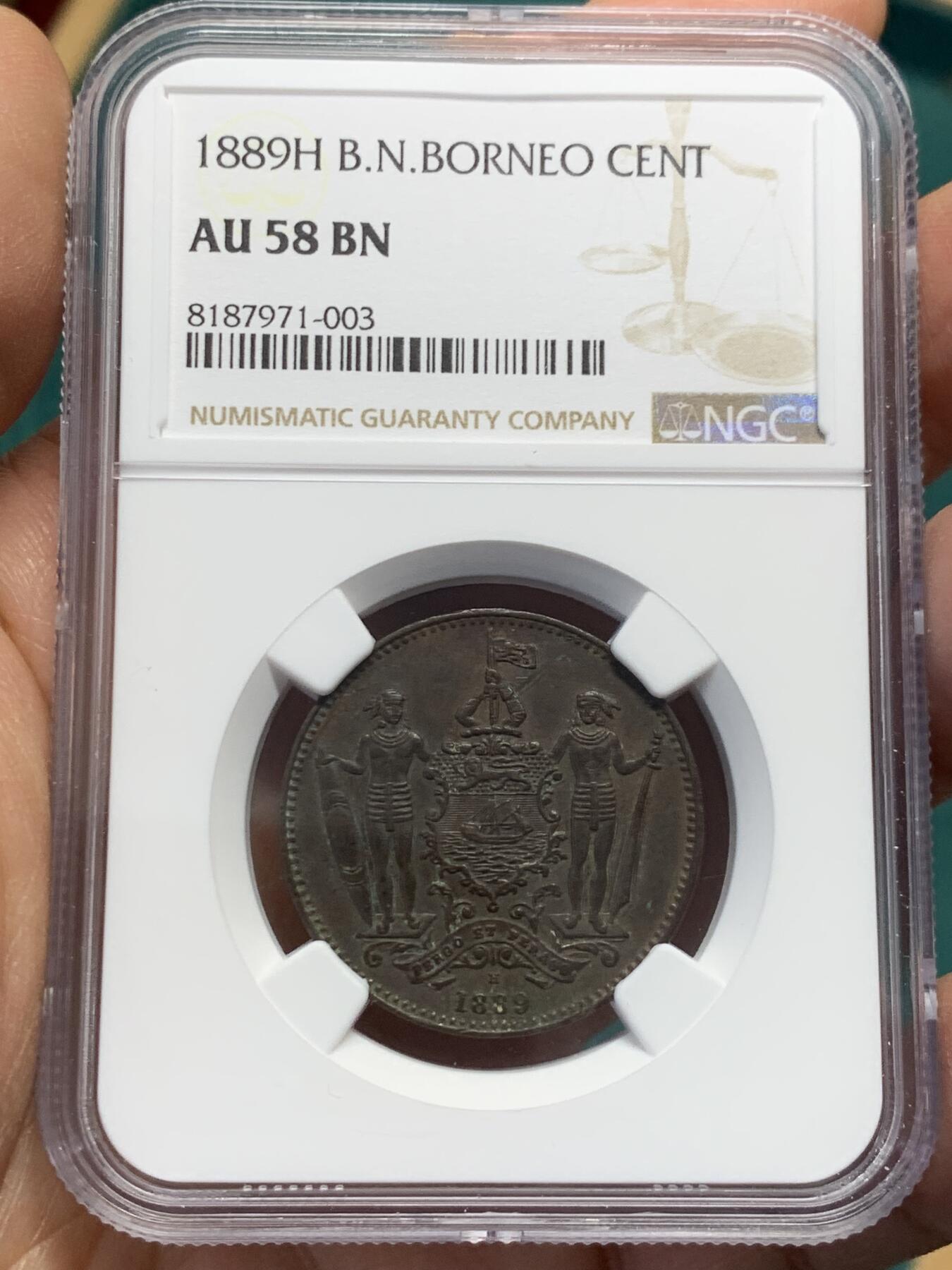 《竞宝斋》第344场 周日，周一，2场连拍 （全场包邮） NGC AU58BN 英属北婆罗洲1889年洋元一分，喜顿厂出品正反面细节到位，高点俱在，东南亚热门币种之一。