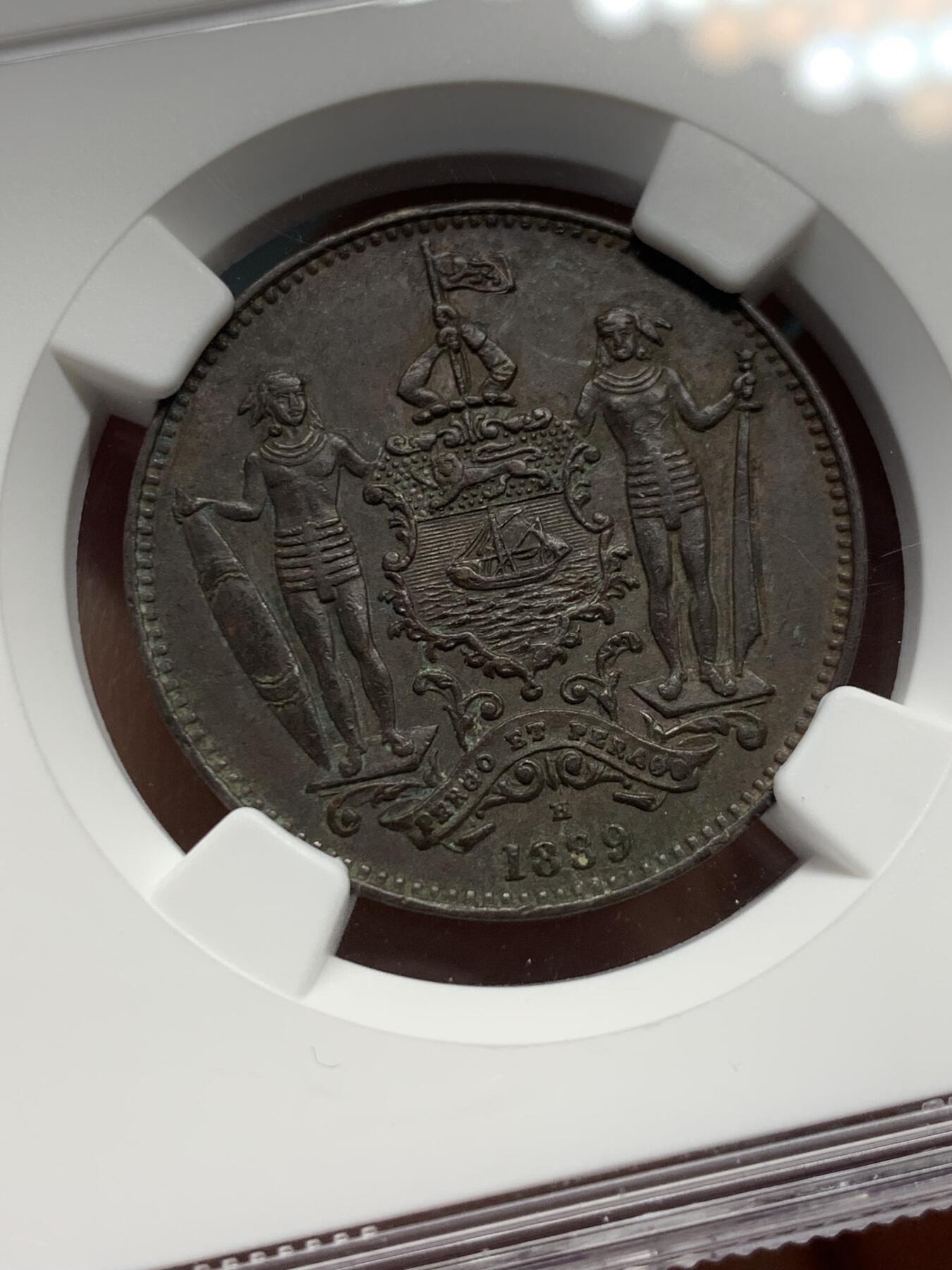 《竞宝斋》第344场 周日，周一，2场连拍 （全场包邮） NGC AU58BN 英属北婆罗洲1889年洋元一分，喜顿厂出品正反面细节到位，高点俱在，东南亚热门币种之一。