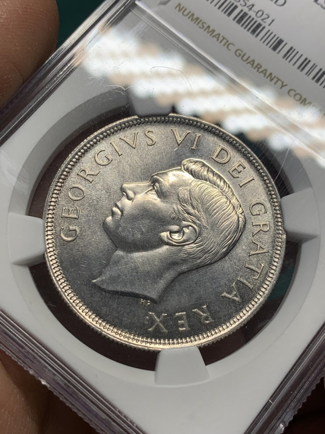《竞宝斋》第344场 周日，周一，2场连拍 （全场包邮） NGC UNCD 加拿大1949年乔治六世1元银币 经典品种 轻微清洗 超高性价比！