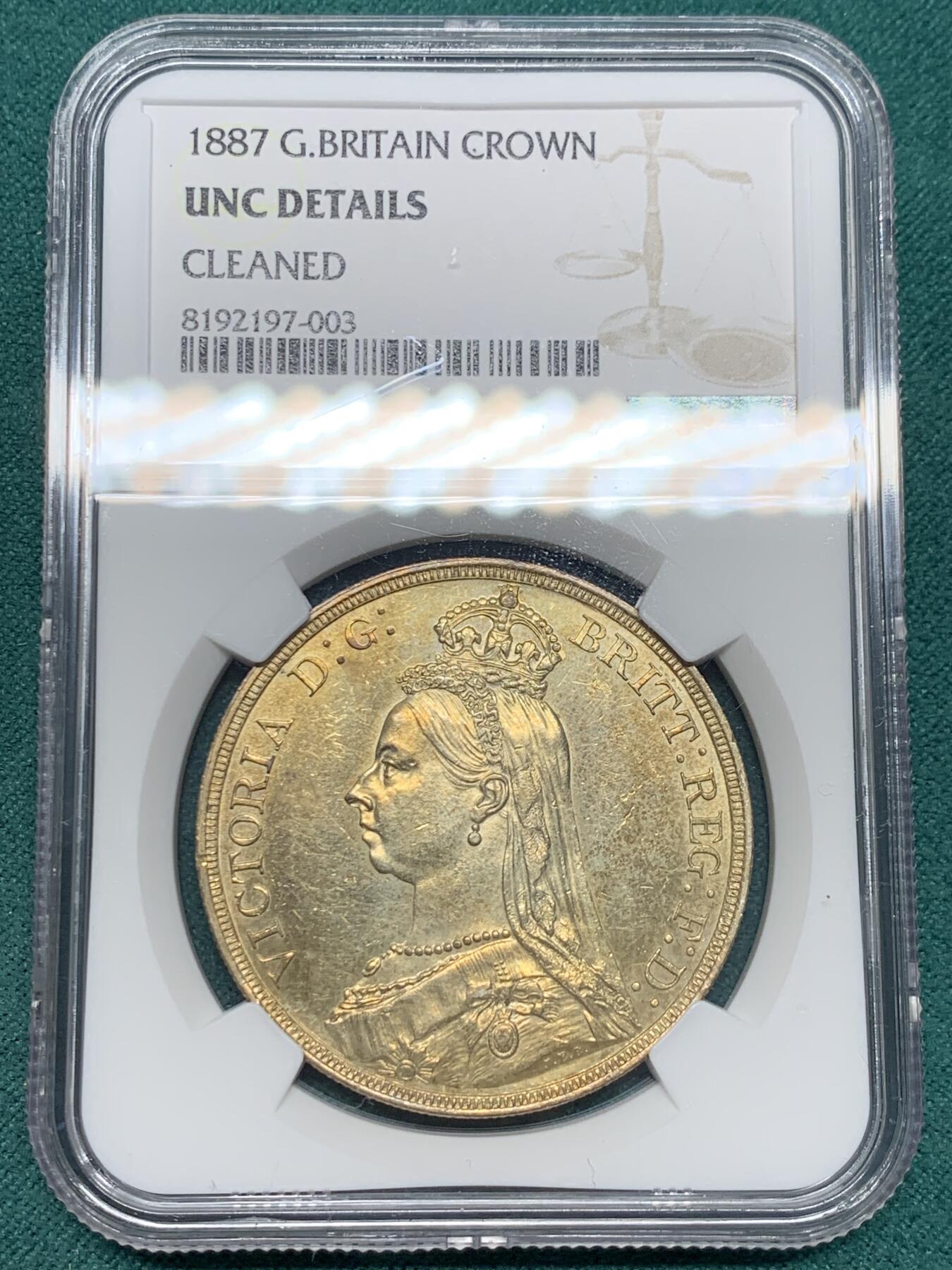 《竞宝斋》第344场 周日，周一，2场连拍 （全场包邮） NGC UNC 英国1887年维多利亚马剑克朗银币 整体金彩包浆