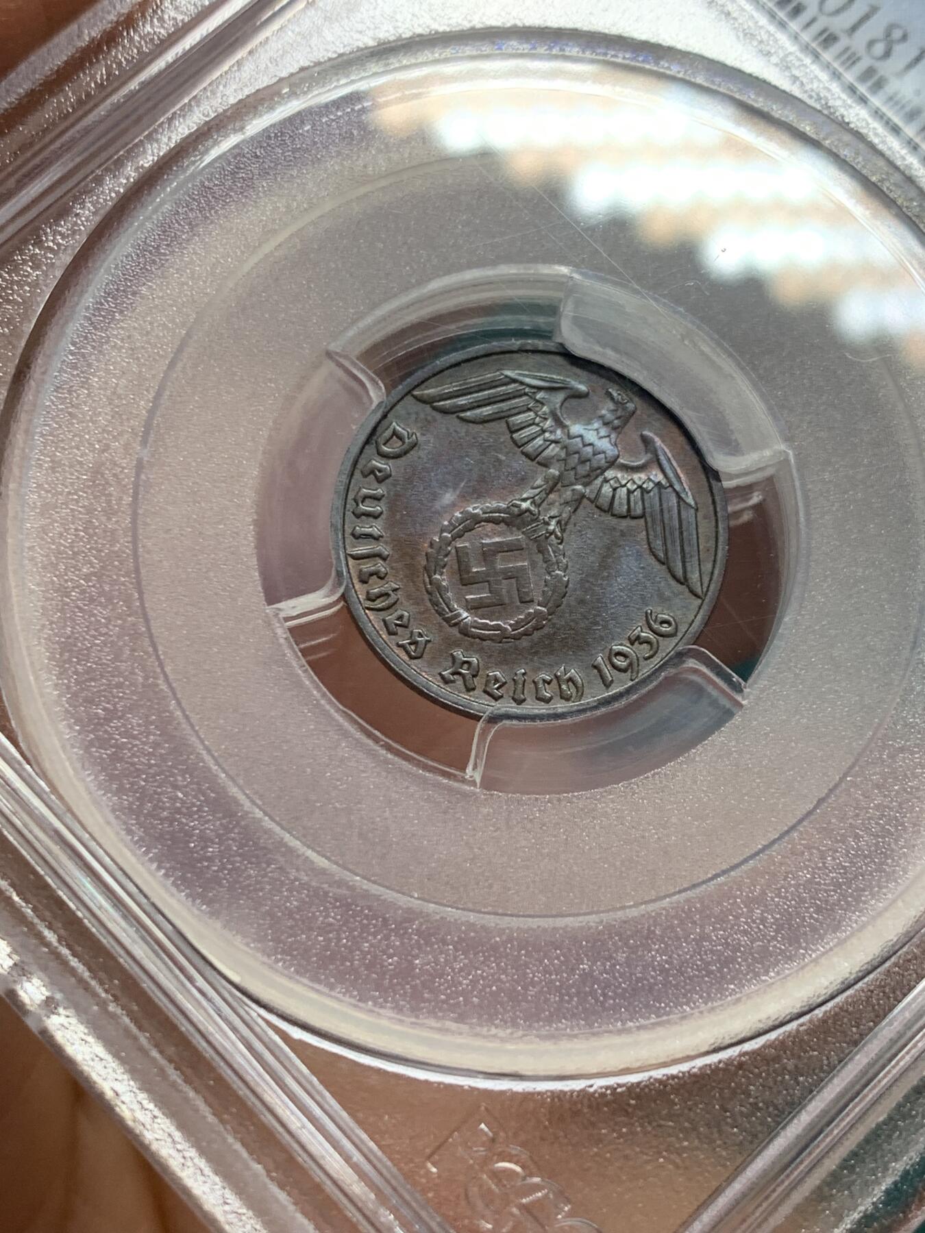 《竞宝斋》第345场 周日，周一，2场连拍 （全场包邮） PCGS MS65BN 德国1936年E版 1芬尼 铜币 PCGS早期评级，版别标注有误。唯一的BN冠军分，另一枚冠军分为65分RB。稀缺年份，发行量仅15万枚！德三1芬尼中最稀缺的一枚，Ebay上唯一一枚EF级就已达到200多美刀，非常难遇到！