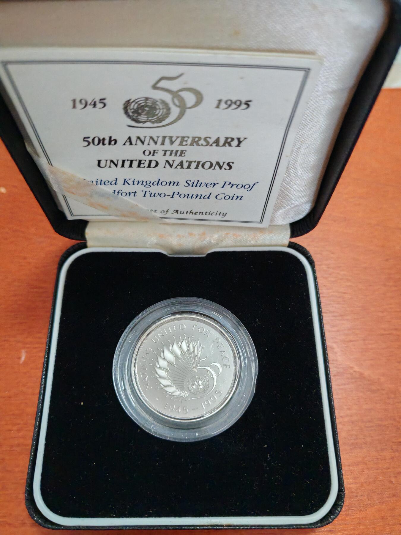 长老汇龙年精选第四十二场拍卖 1995英国联合国成立50周年2英镑精制加厚银币，盒证全，少见！