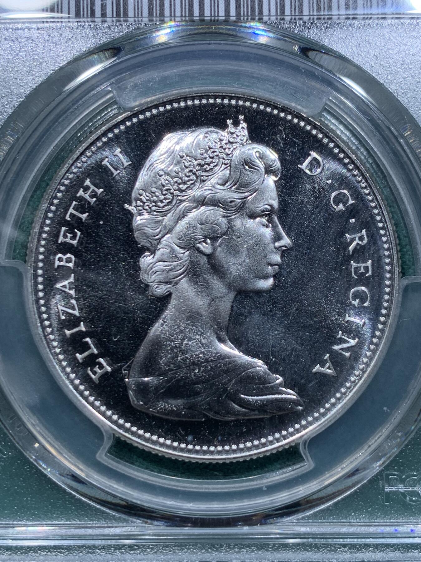 《竞宝斋》第345场 周日，周一，2场连拍 （全场包邮） PCGS PL66 加拿大1967年大雁1元银币，币面干净漂亮！热门品种！