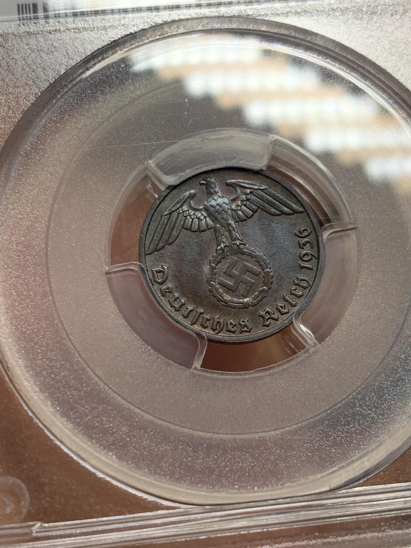《竞宝斋》第345场 周日，周一，2场连拍 （全场包邮） PCGS MS65BN 德国1936年E版 1芬尼 铜币 PCGS早期评级，版别标注有误。唯一的BN冠军分，另一枚冠军分为65分RB。稀缺年份，发行量仅15万枚！德三1芬尼中最稀缺的一枚，Ebay上唯一一枚EF级就已达到200多美刀，非常难遇到！