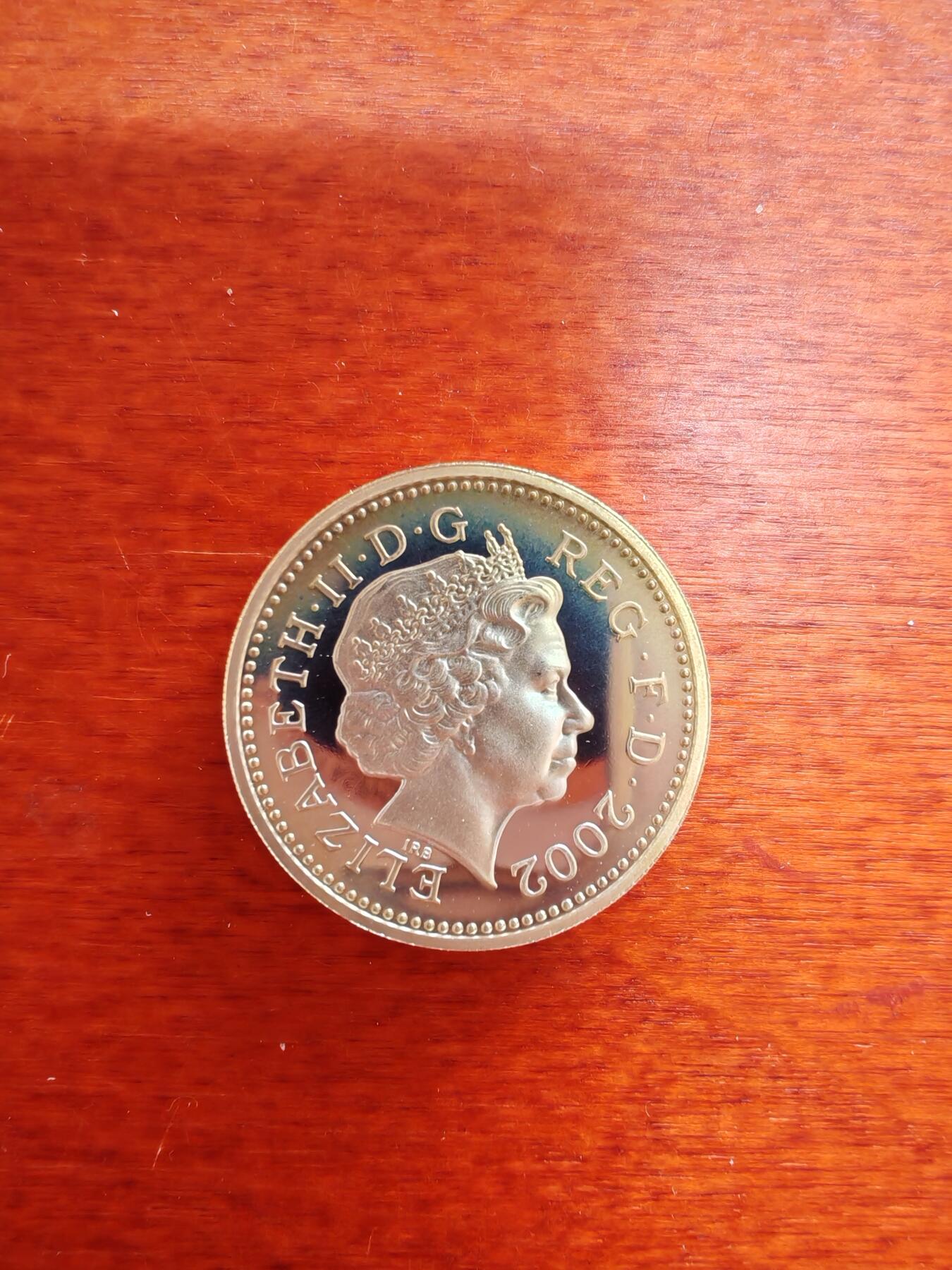长老汇龙年精选第四十三场拍卖 2002英国英格兰三狮1英镑精制加厚银币，盒证全，1万套