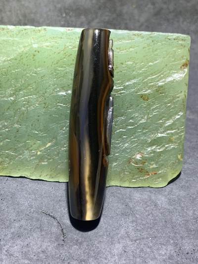 精美亚光高玉化一线巴西玛瑙手工俏色巧雕无相佛，佛字意境桶珠一个！ 精美亚光高玉化一线巴西玛瑙手工俏色巧雕无相佛，佛字意境桶珠一个！