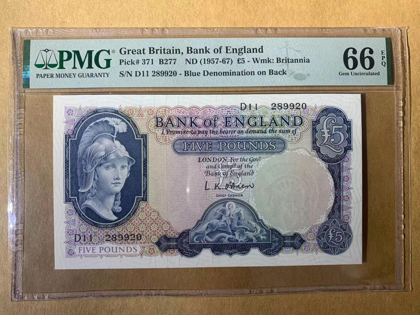 【礼羽收藏】🌏世界钱币拍卖第131期 【D11 289920】1957年英国B序列5镑纸币 早期初版 蓝色实心版 无3457朦胧号 PMG66  圣乔治屠龙