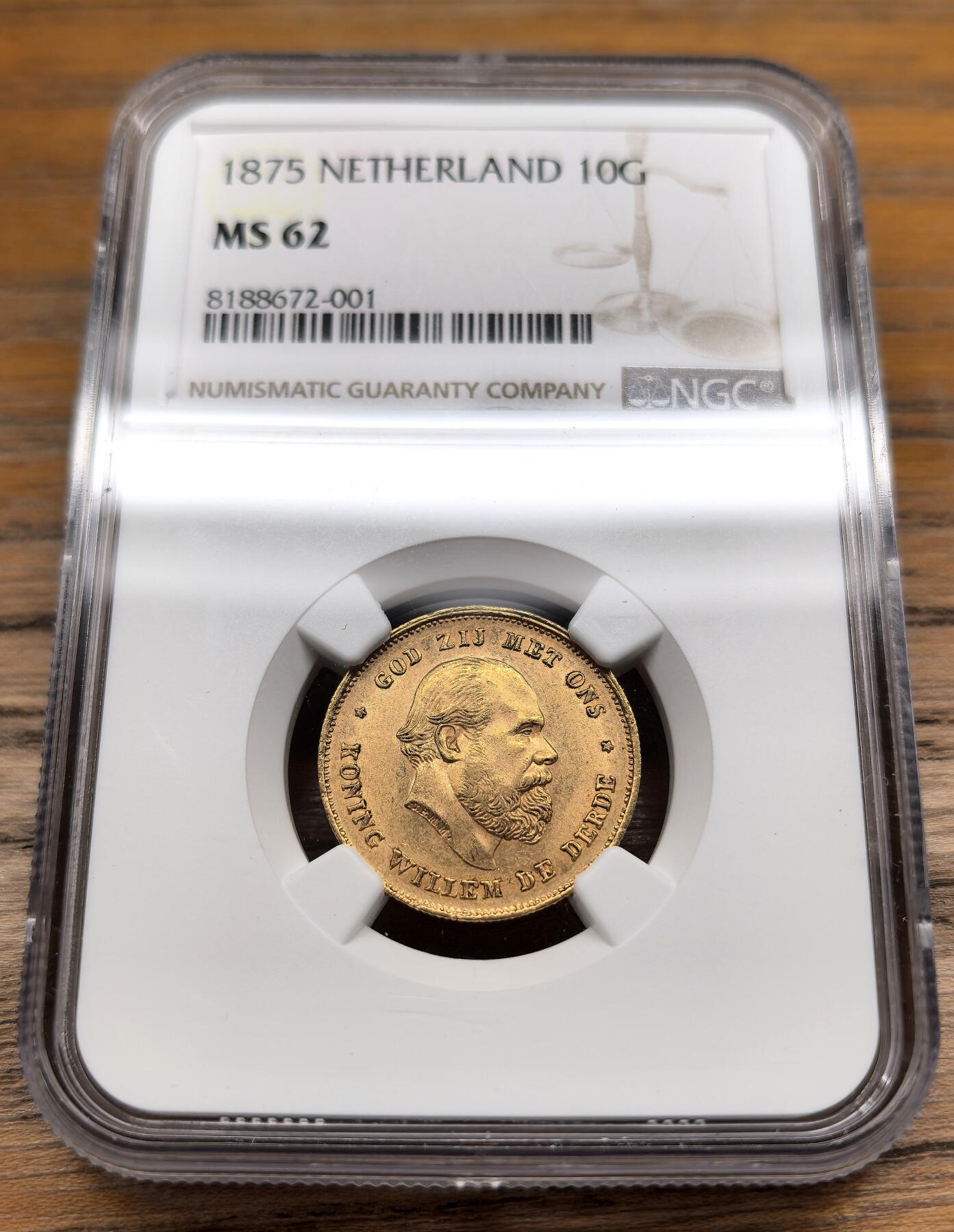 凡希社世界钱币微拍第二百九十五期 1875荷兰威廉三世10盾金币NGC-MS62，年份在皇冠上方，一年版，6.729g，900金。