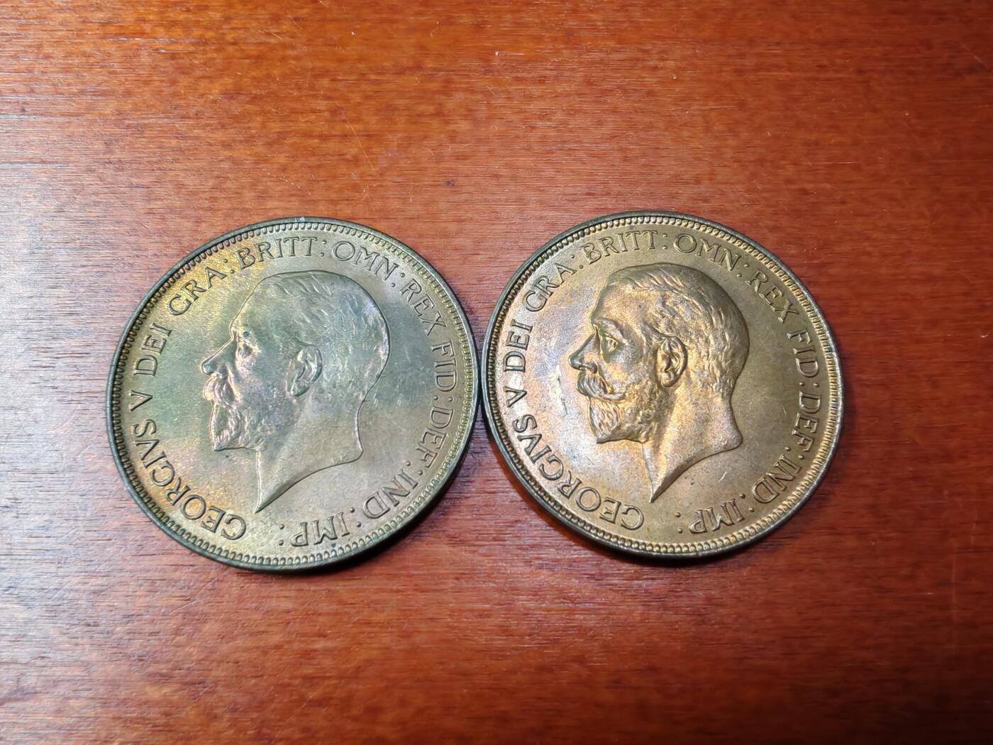 长老汇龙年精选第四十四场拍卖 1935英国乔治五世1便士铜币两枚，未流通，自己送评出分大约63-65之间，都有透打现象