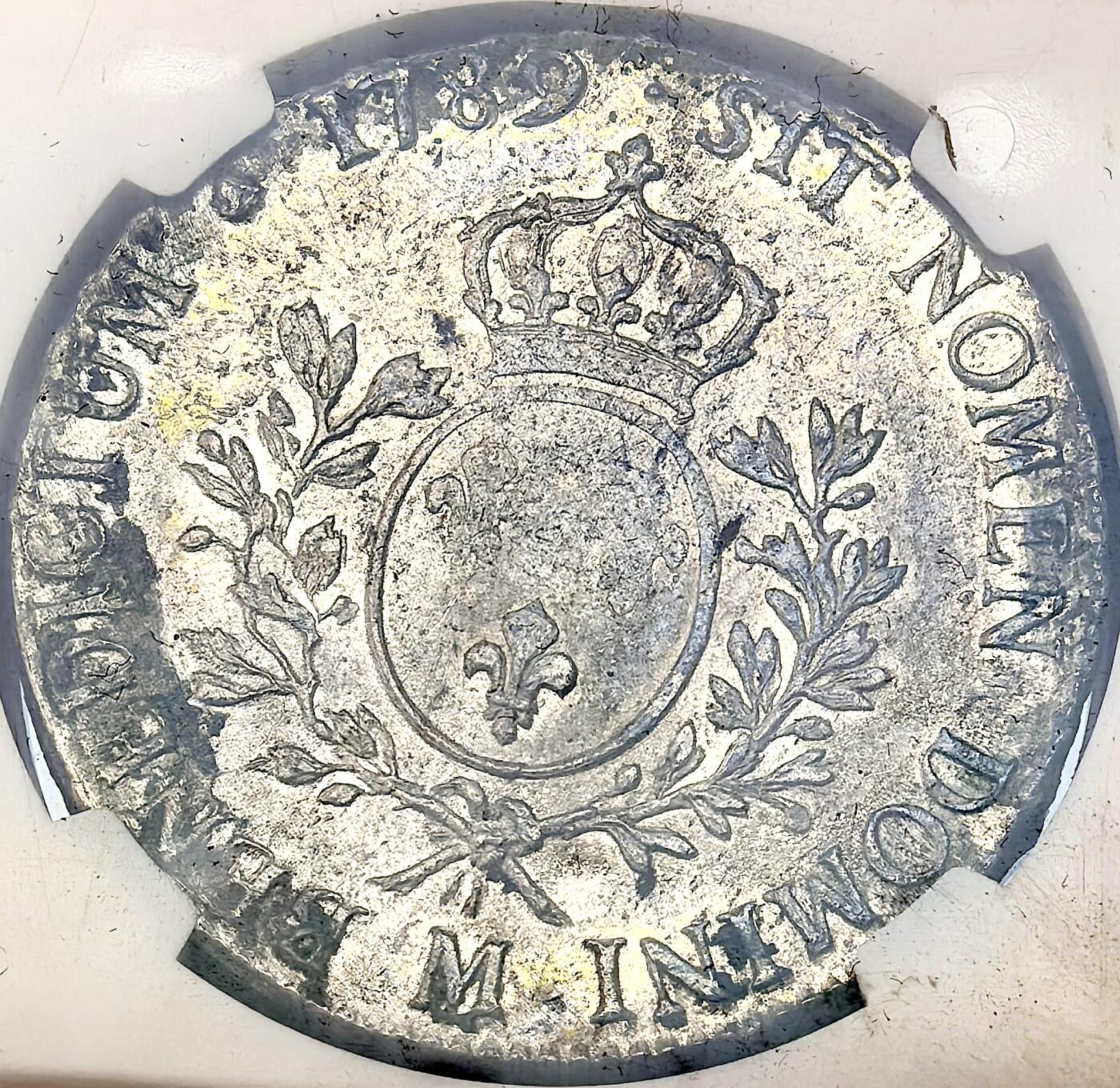 凡希社世界钱币微拍第二百九十五期 1789M法国路易十六埃居大银NGC-AUD，边缘有几处脏污附着，实物为带底光的未流通品相，上手惊喜！