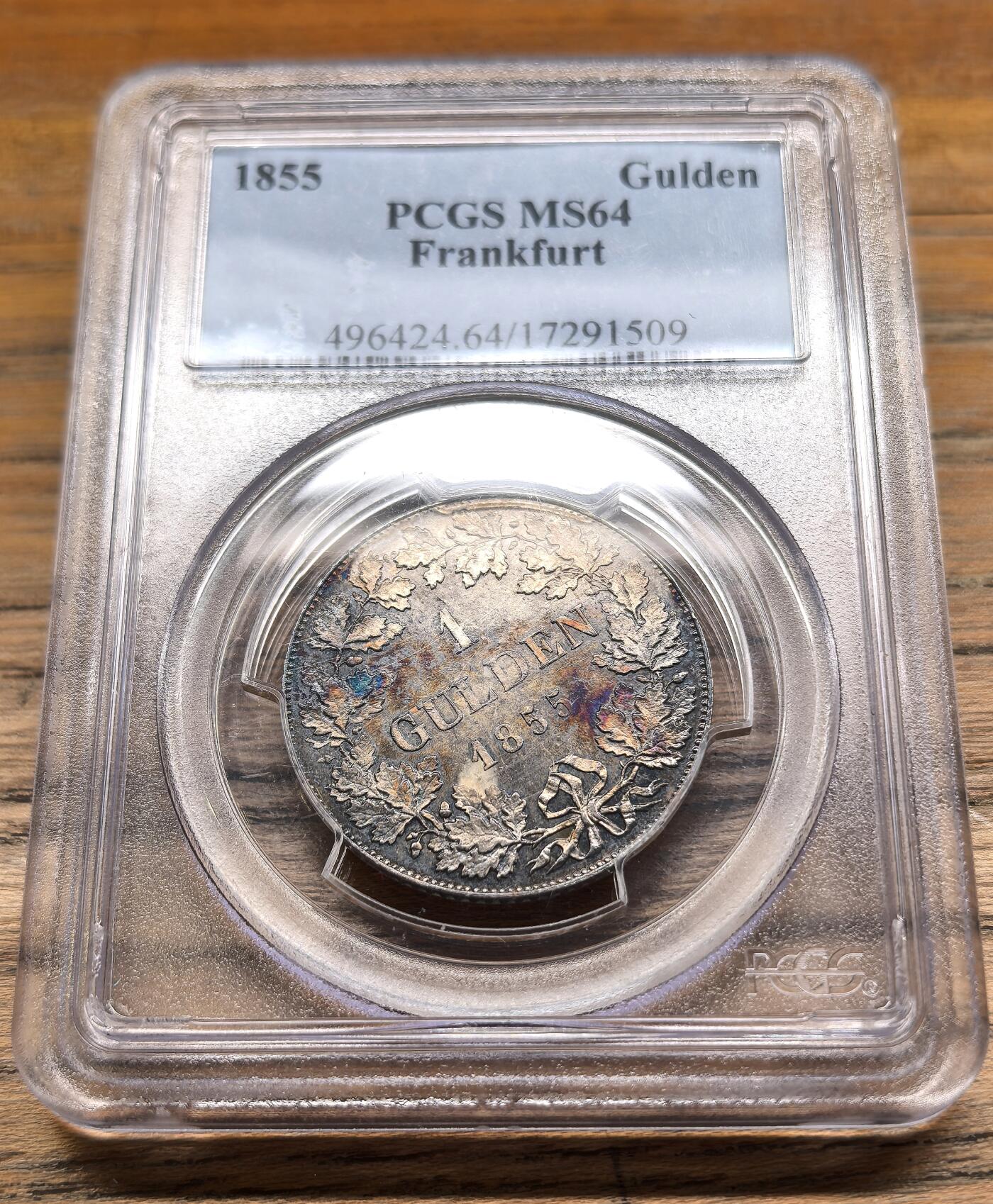 凡希社世界钱币微拍第二百九十五期 1855德国法兰克福古尔登银币PCGS-MS64，大花纹版，关门年份，发行仅38000枚，焦糖色五彩，实物相当精彩的一枚！