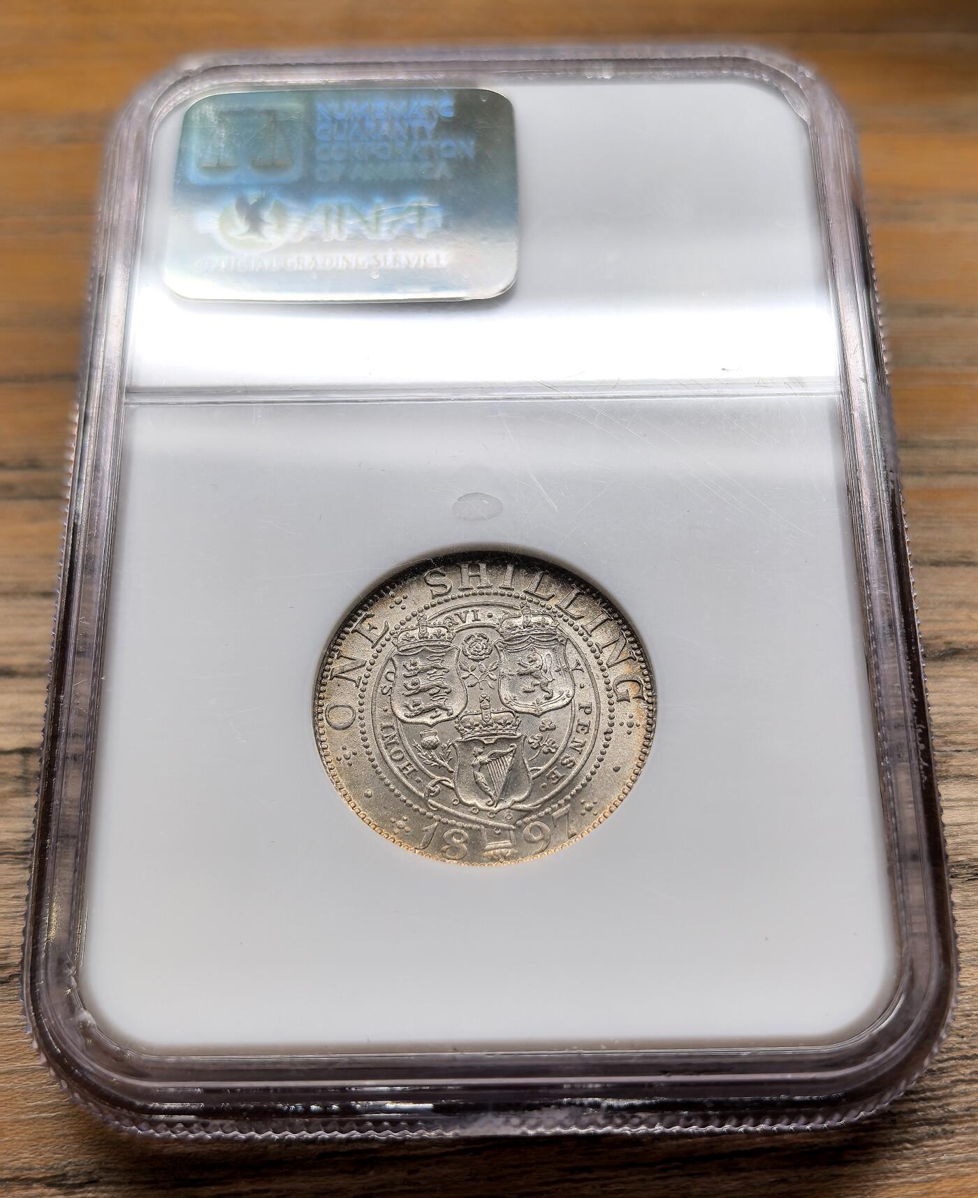凡希社世界钱币微拍第二百九十五期 1897英国老维批纱先令NGC-MS65，养眼粉彩！